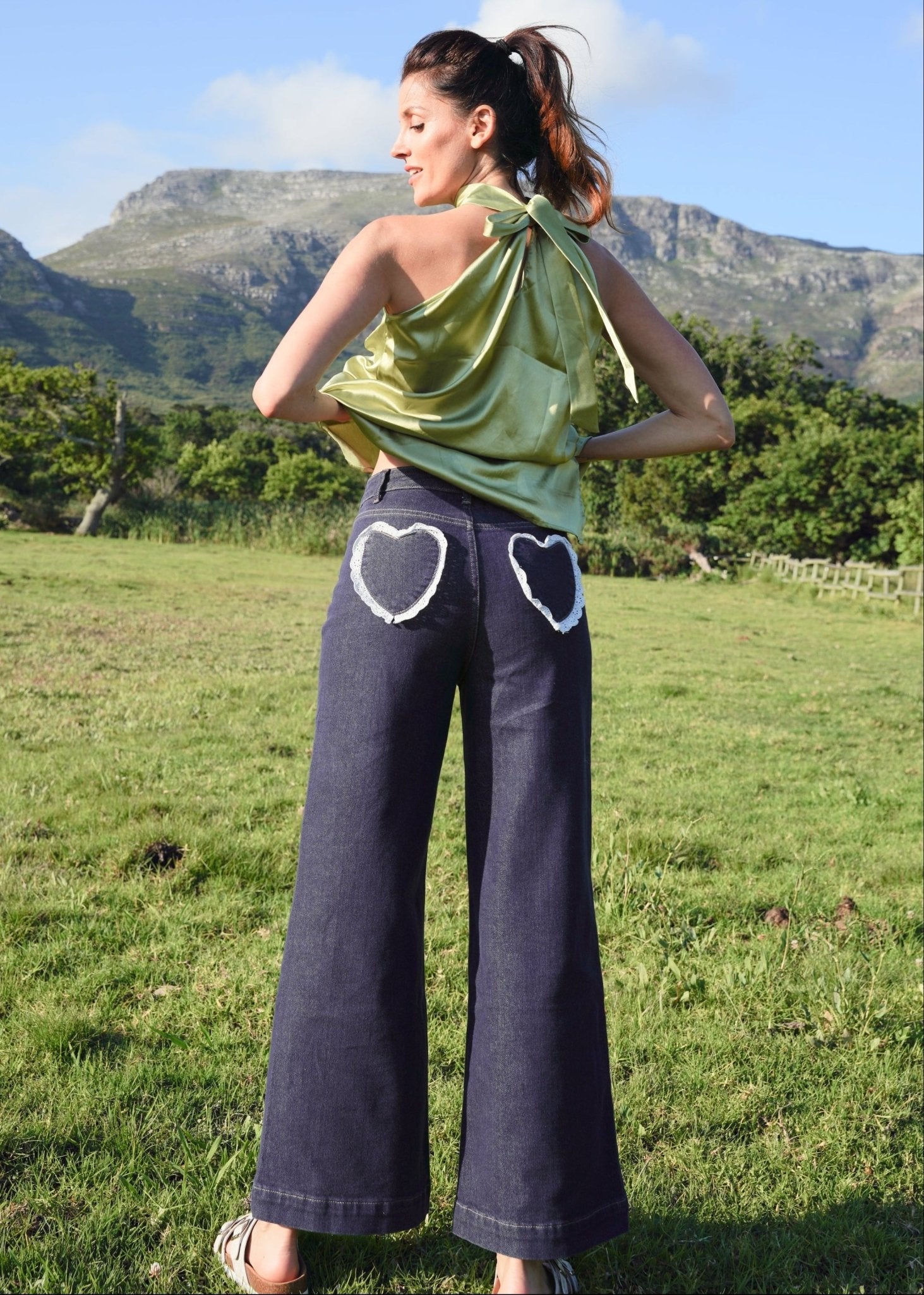 View our Wide Leg Jeans with Lace Heart on Back Pockets - by Tribute Store