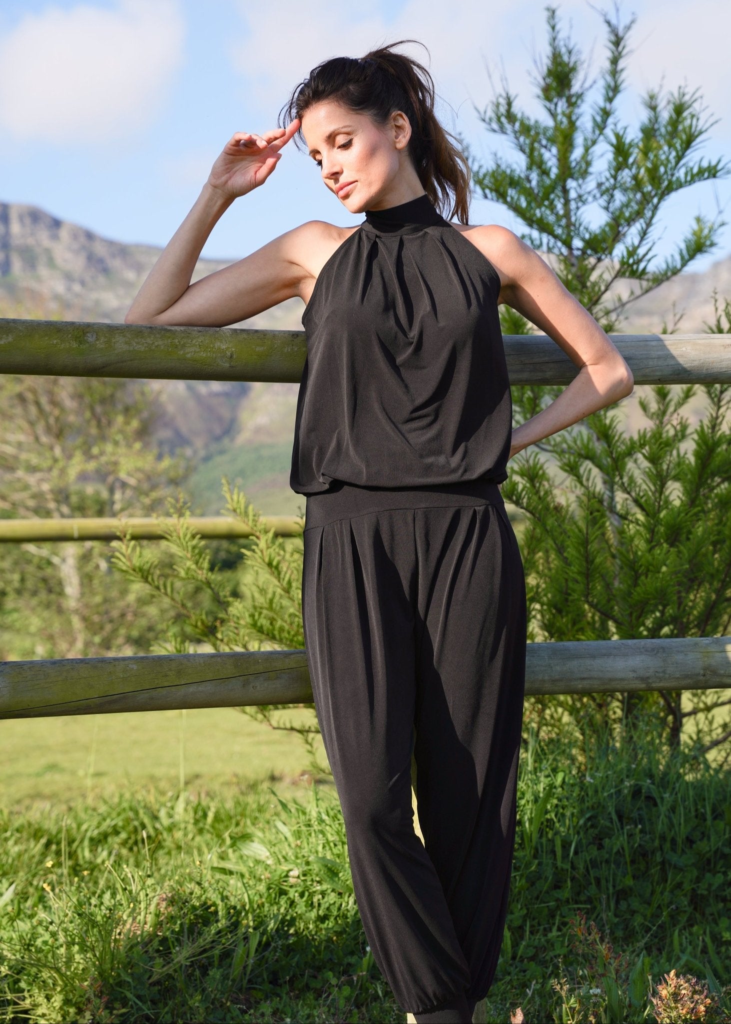 View our Zarah Halterneck Jumpsuit in Black - by Tribute Store