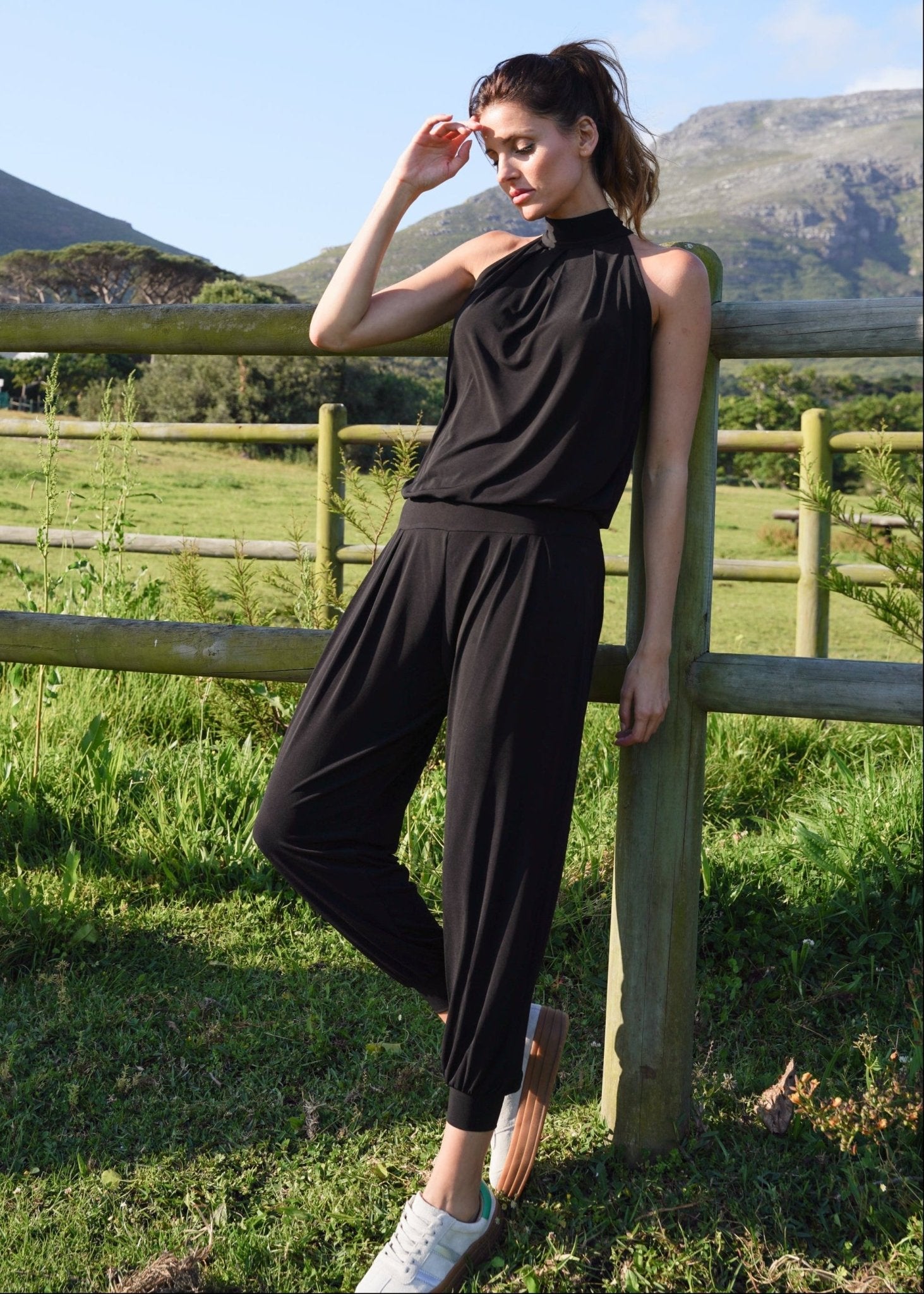 View our Zarah Halterneck Jumpsuit in Black - by Tribute Store