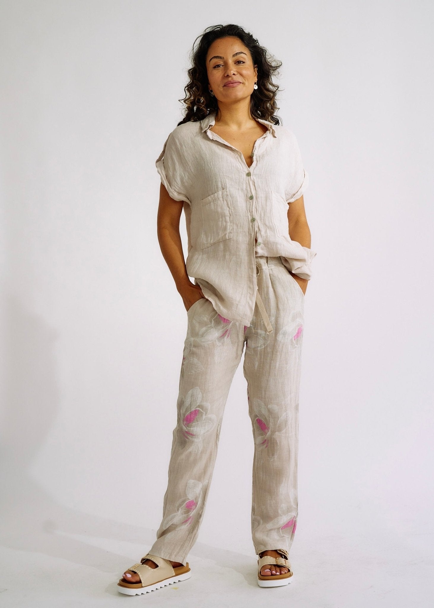 View our Pure Linen Italian Floral Printed Joggers Beige - The ultimate BOTTOMS created by TRIBUTE and sold here, at Tribute Store