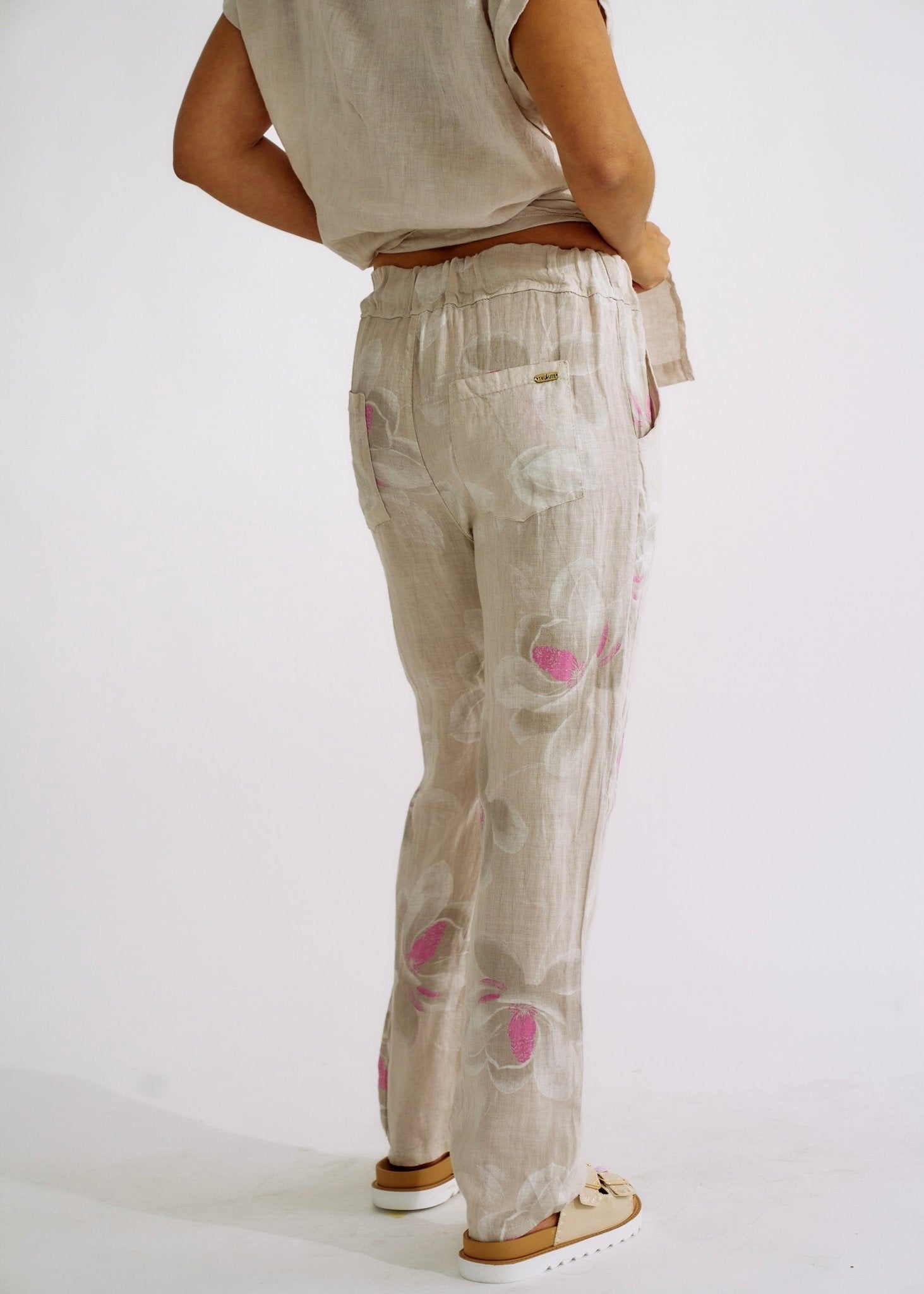 View our Pure Linen Italian Floral Printed Joggers Beige - The ultimate BOTTOMS created by TRIBUTE and sold here, at Tribute Store