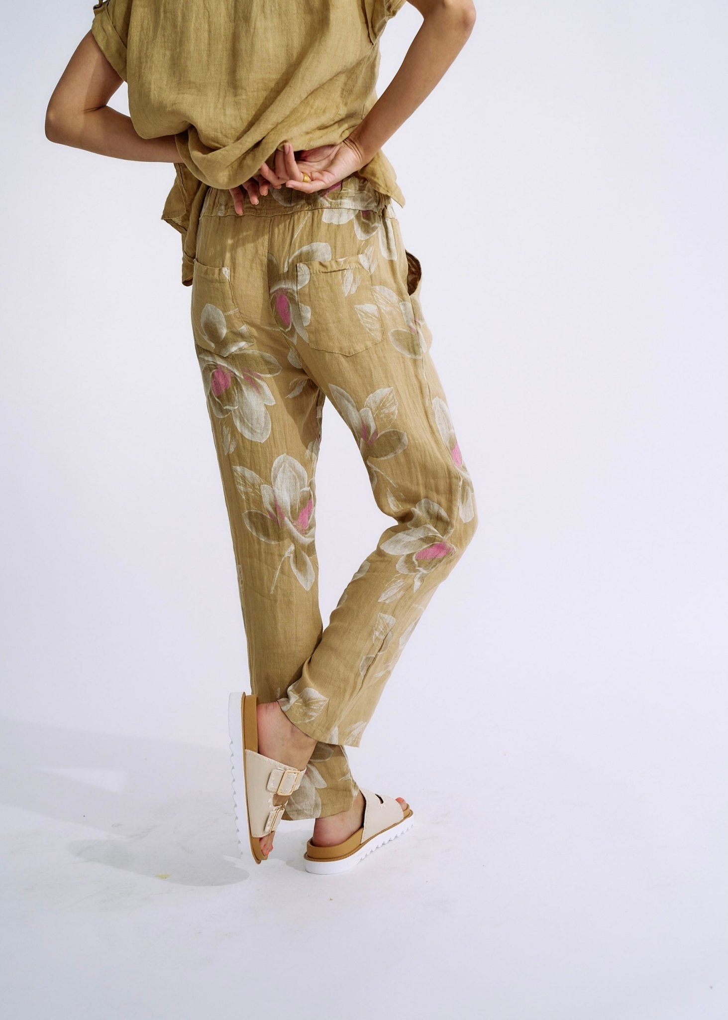 View our Pure Linen Italian Floral Printed Joggers Cappuccino - The ultimate BOTTOMS created by TRIBUTE and sold here, at Tribute Store