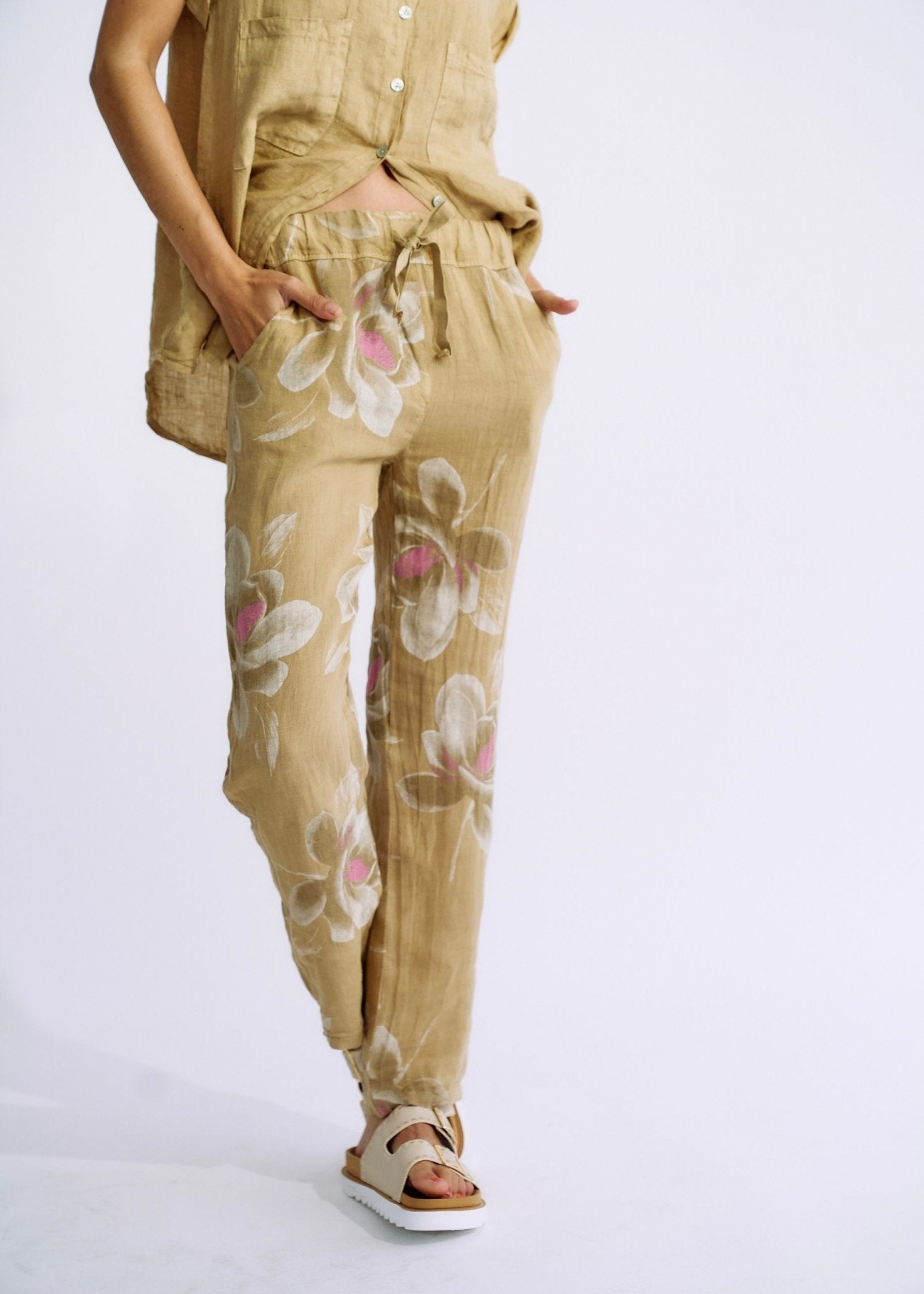 View our Pure Linen Italian Floral Printed Joggers Cappuccino - The ultimate BOTTOMS created by TRIBUTE and sold here, at Tribute Store