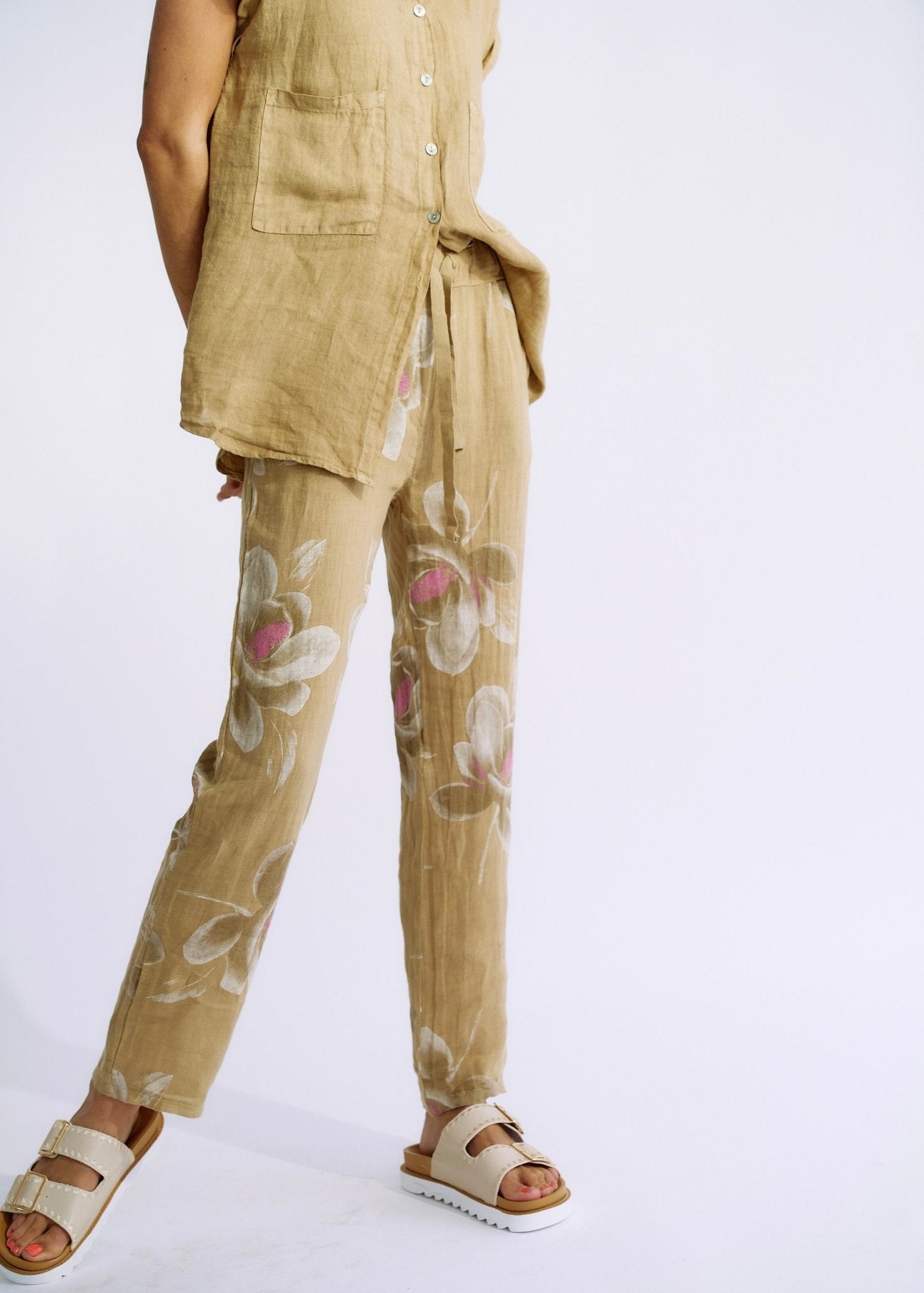 View our Pure Linen Italian Floral Printed Joggers Cappuccino - The ultimate BOTTOMS created by TRIBUTE and sold here, at Tribute Store
