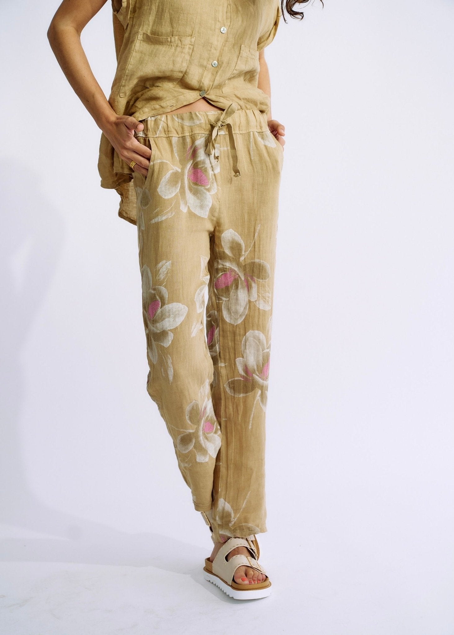 View our Pure Linen Italian Floral Printed Joggers Cappuccino - The ultimate BOTTOMS created by TRIBUTE and sold here, at Tribute Store