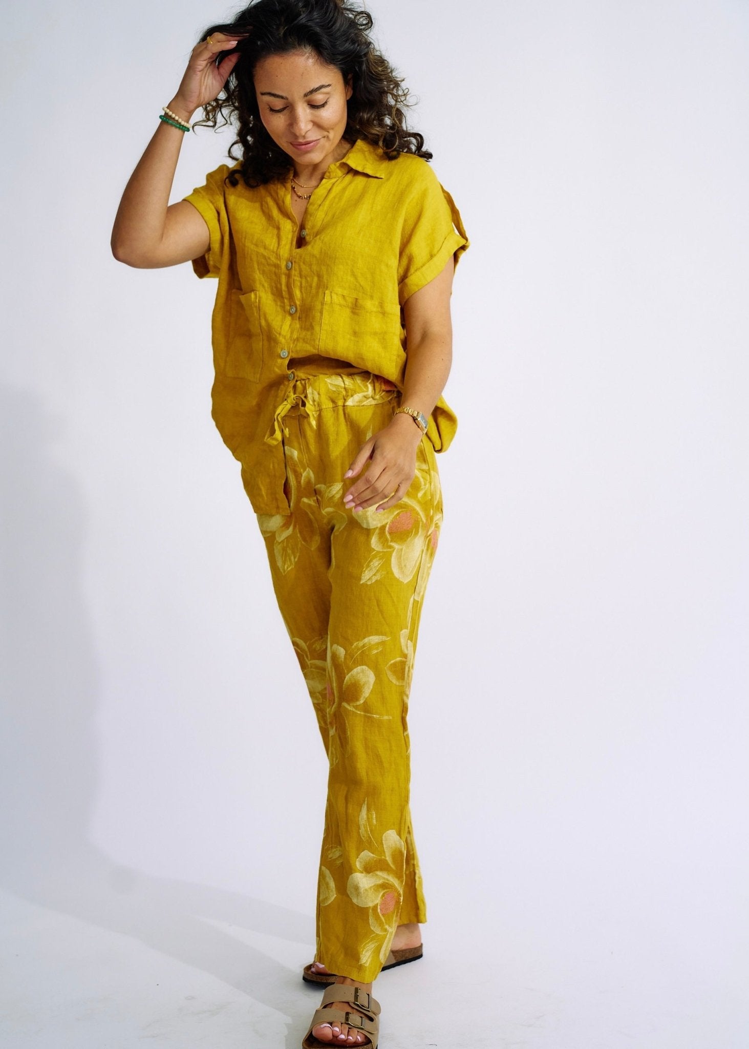 View our Pure Linen Italian Floral Printed Joggers Deep Yellow - The ultimate BOTTOMS created by TRIBUTE and sold here, at Tribute Store