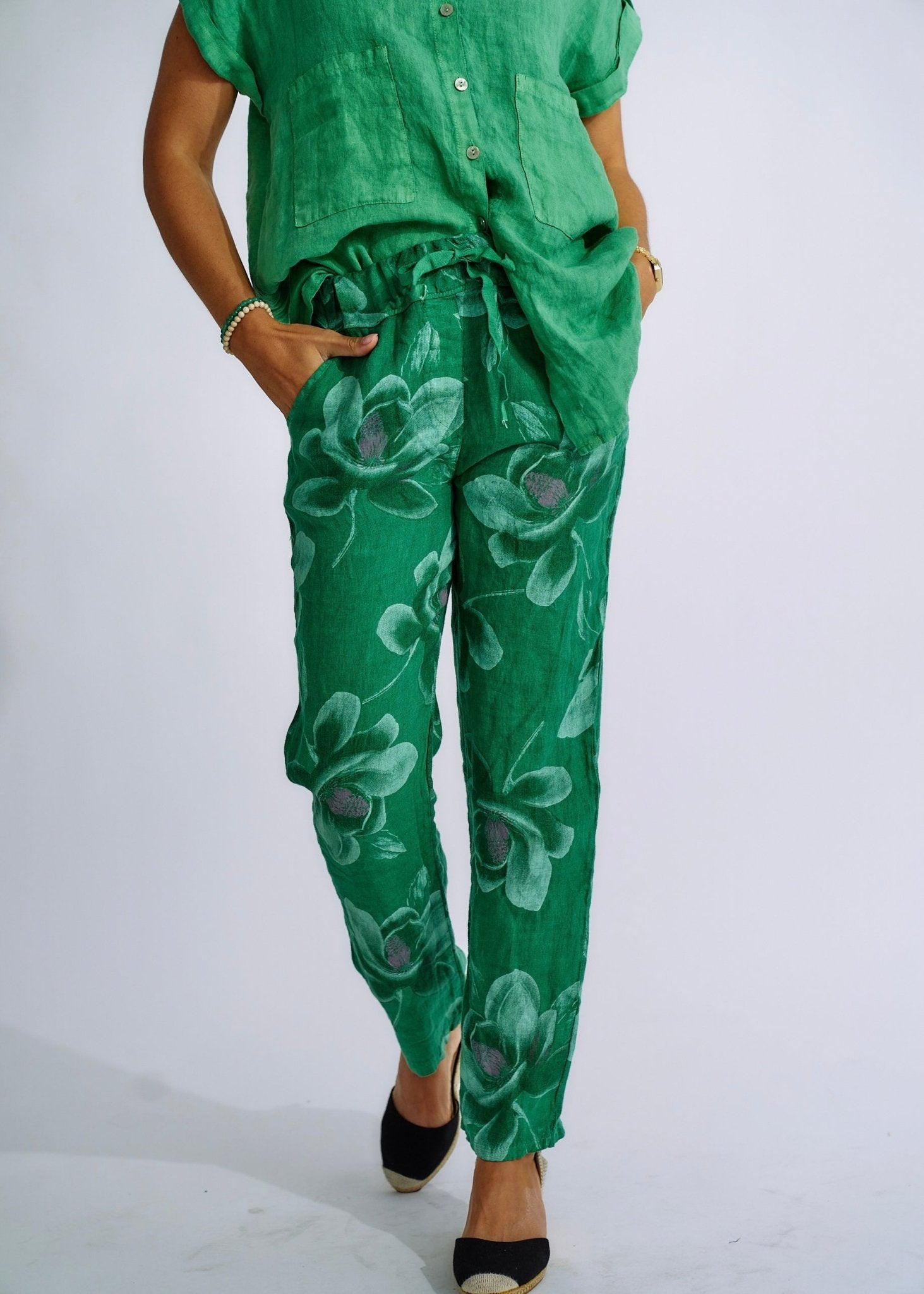 View our Pure Linen Italian Floral Printed Joggers in Forest Green - The ultimate BOTTOMS created by TRIBUTE and sold here, at Tribute Store