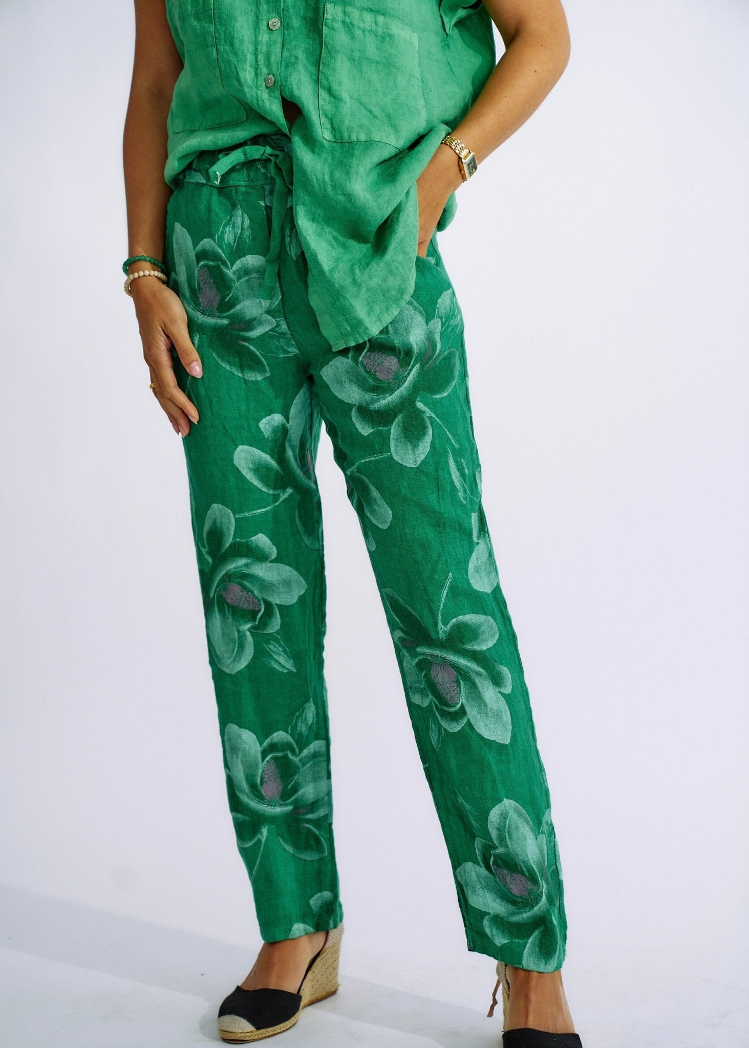 View our Pure Linen Italian Floral Printed Joggers in Forest Green - The ultimate BOTTOMS created by TRIBUTE and sold here, at Tribute Store