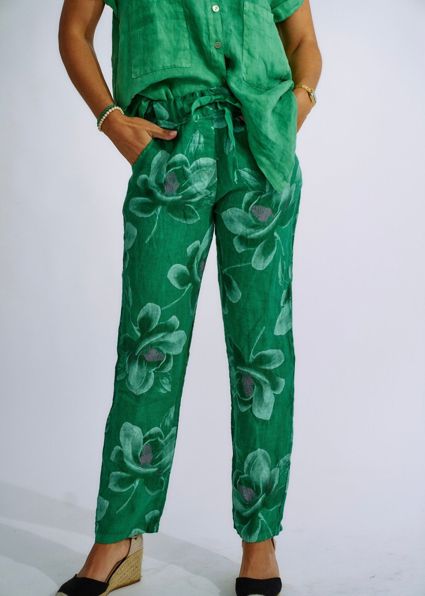 View our Pure Linen Italian Floral Printed Joggers in Forest Green - The ultimate BOTTOMS created by TRIBUTE and sold here, at Tribute Store
