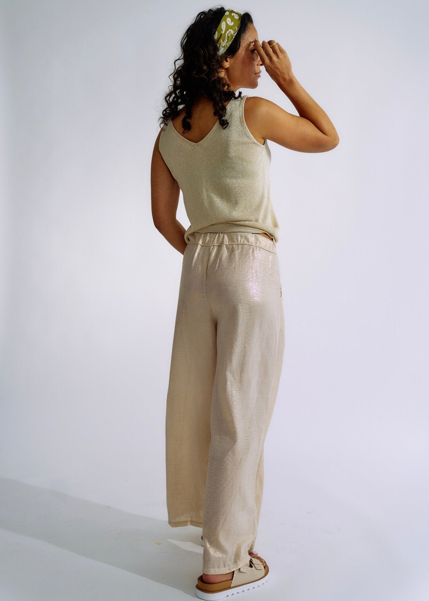 View our Pure Linen Italian Wide Leg Shimmer Pants in Beige - The ultimate BOTTOMS created by TRIBUTE and sold here, at Tribute Store