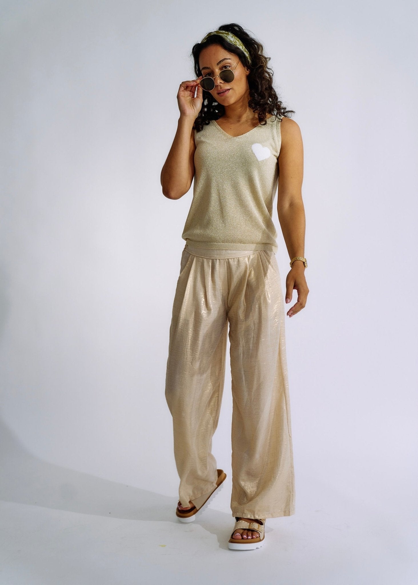 View our Pure Linen Italian Wide Leg Shimmer Pants in Beige - The ultimate BOTTOMS created by TRIBUTE and sold here, at Tribute Store