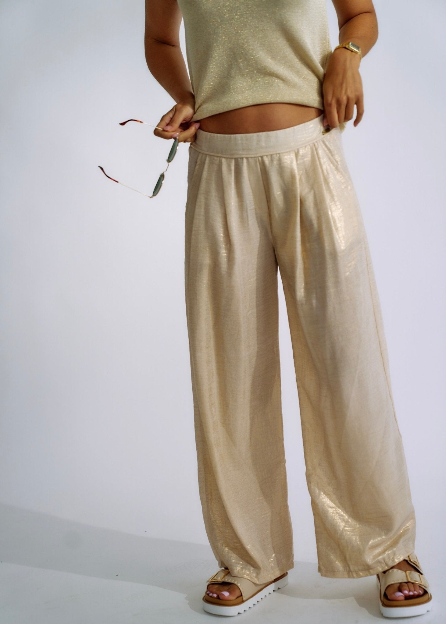 View our Pure Linen Italian Wide Leg Shimmer Pants in Beige - The ultimate BOTTOMS created by TRIBUTE and sold here, at Tribute Store