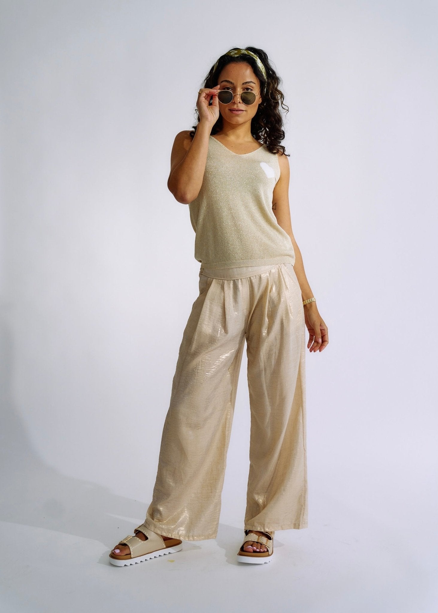 View our Pure Linen Italian Wide Leg Shimmer Pants in Beige - The ultimate BOTTOMS created by TRIBUTE and sold here, at Tribute Store