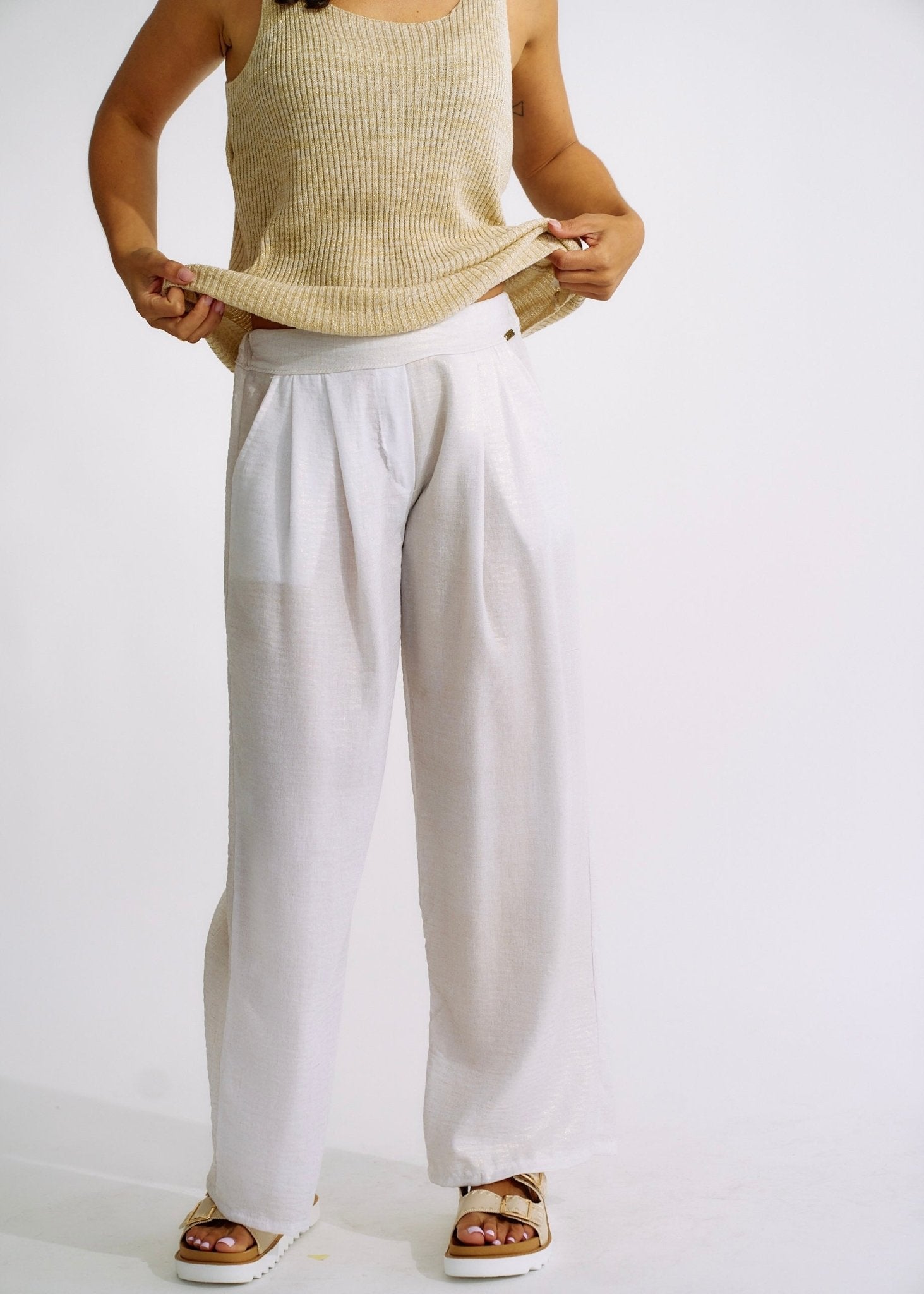 View our Pure Linen Italian Wide Leg Shimmer Pants in White - The ultimate BOTTOMS created by TRIBUTE and sold here, at Tribute Store