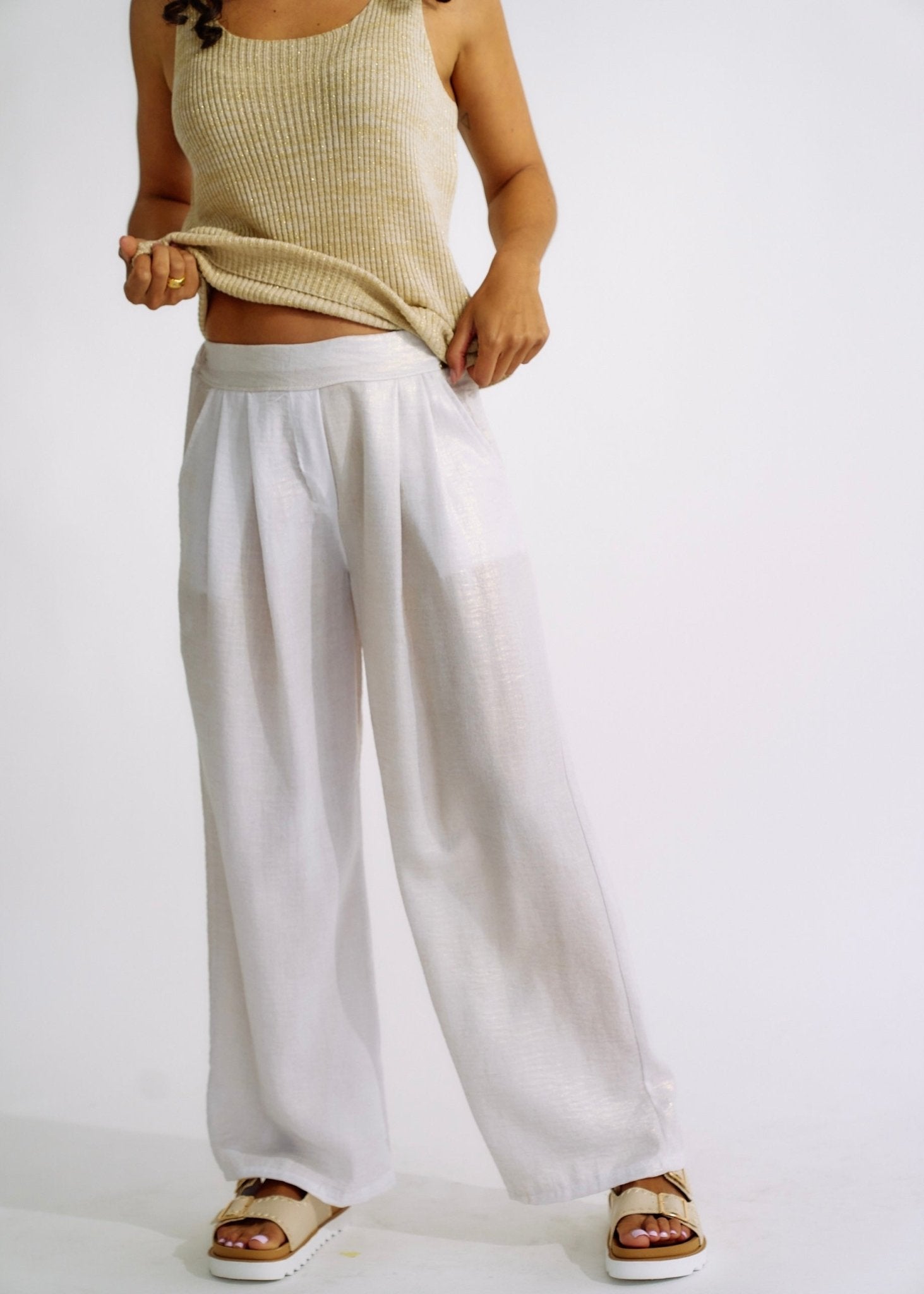 View our Pure Linen Italian Wide Leg Shimmer Pants in White - The ultimate BOTTOMS created by TRIBUTE and sold here, at Tribute Store