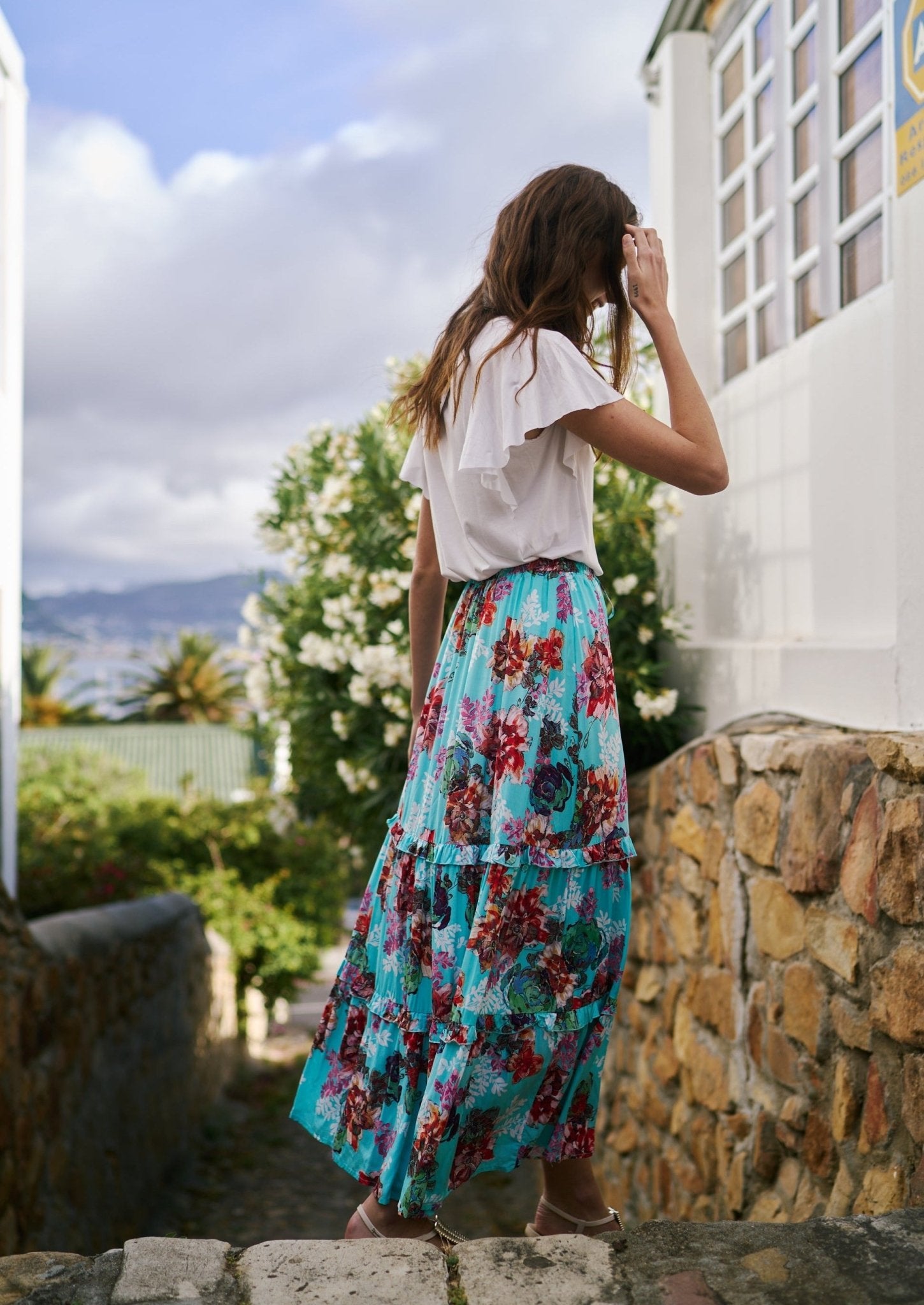 View our Flared Bohemian Tiered Skirt in Turquoise Floral Print - by Tribute Store