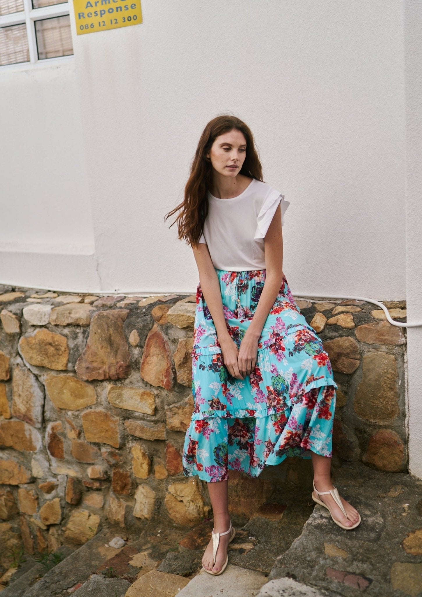 View our Flared Bohemian Tiered Skirt in Turquoise Floral Print - by Tribute Store