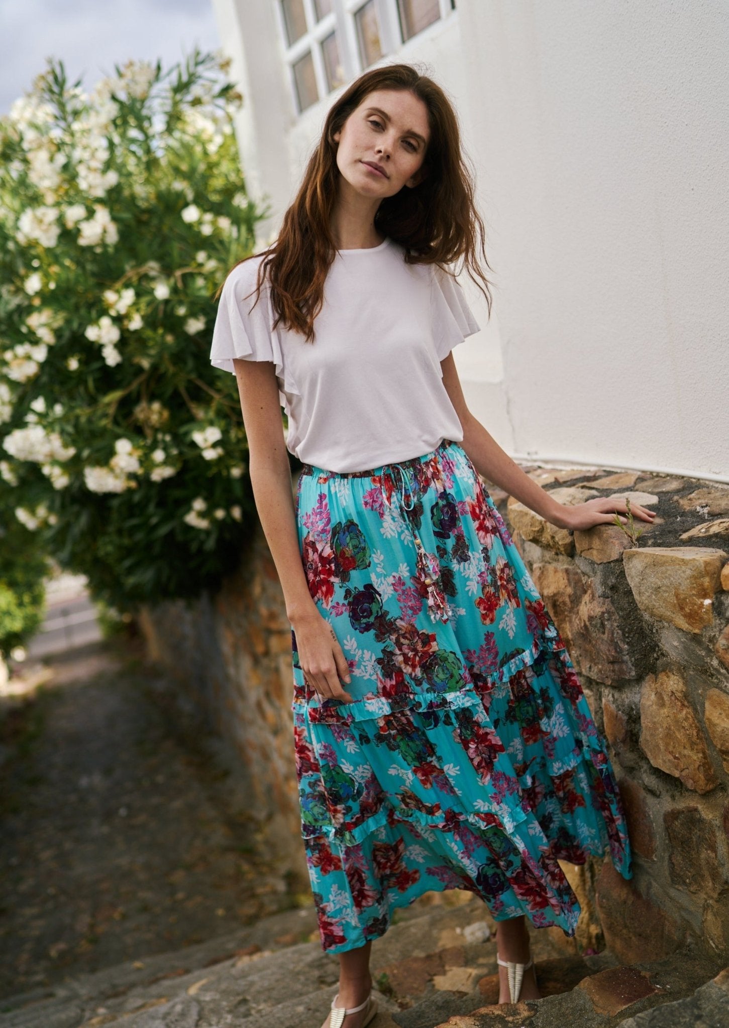 View our Flared Bohemian Tiered Skirt in Turquoise Floral Print - by Tribute Store