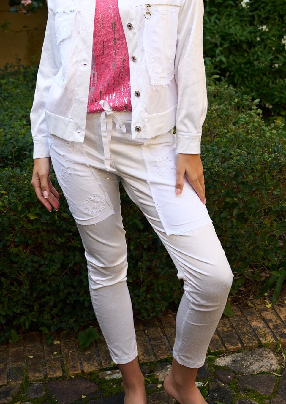 View our Italian Iridescent Cotton Joggers in White - by Tribute Store