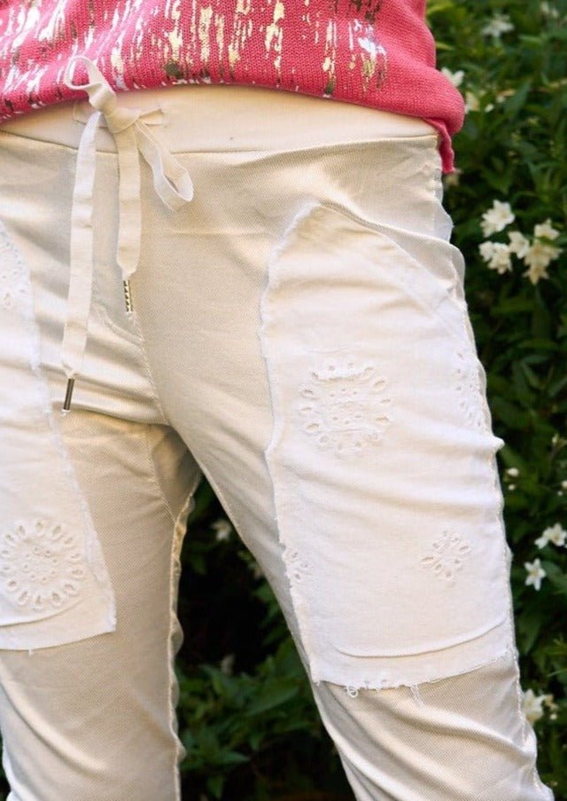 View our Italian Iridescent Cotton Joggers in White - by Tribute Store