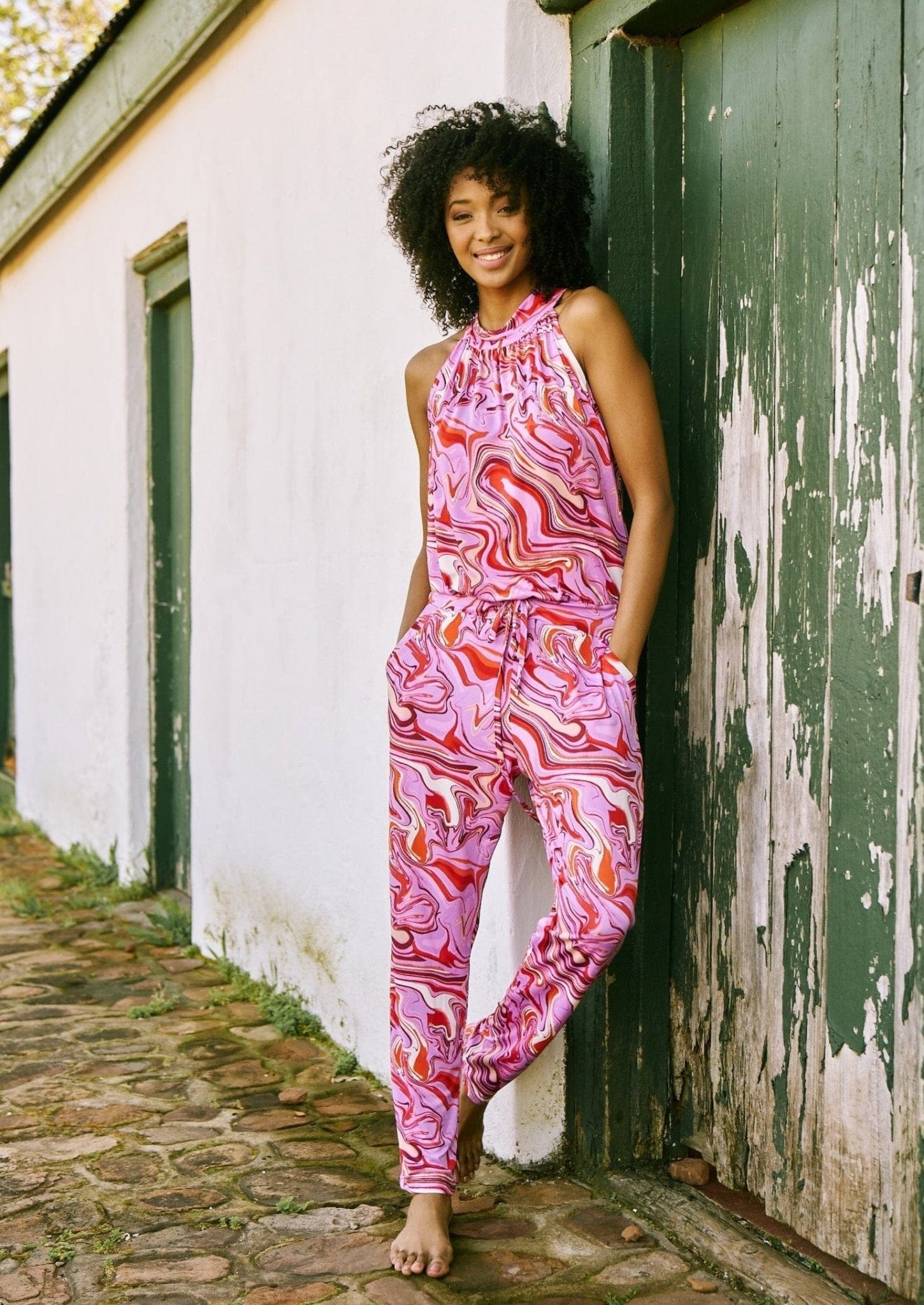 View our Purple Swirl Halter Neck Jumpsuit With Narrow Leg - The ultimate JUMPSUITS created by ICONIC and sold here, at Tribute Store