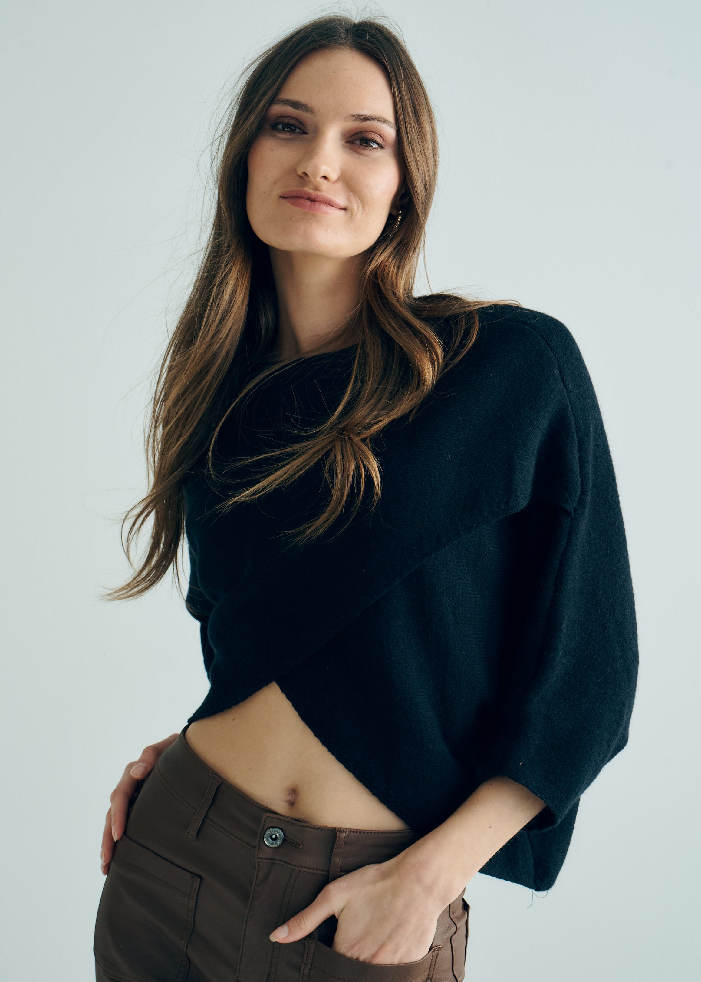 Hygge Italian Viscose Criss Cross Batwing Sleeve Knit In Black