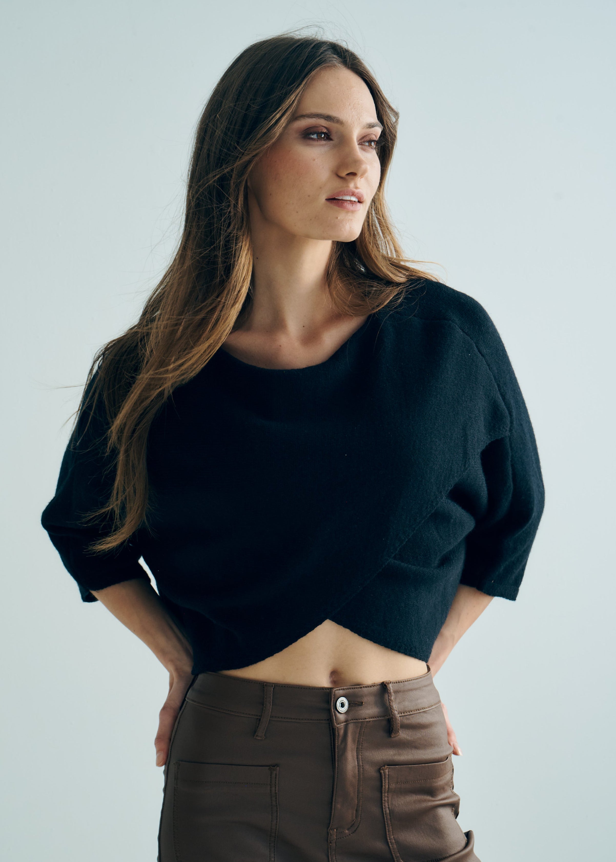 Hygge Italian Viscose Criss Cross Batwing Sleeve Knit In Black