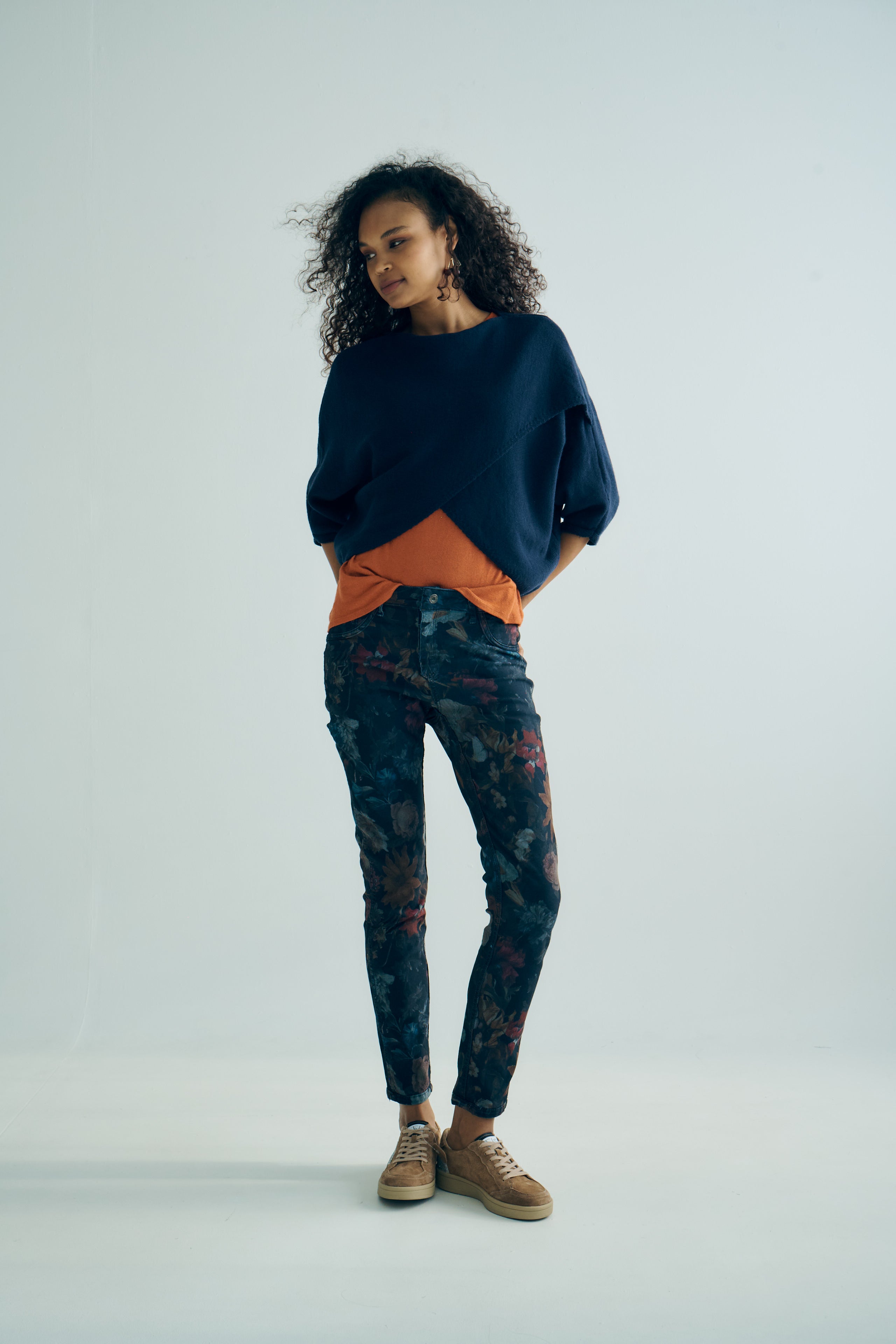 Hygge Italian Viscose Criss Cross Batwing Sleeve Knit In Navy