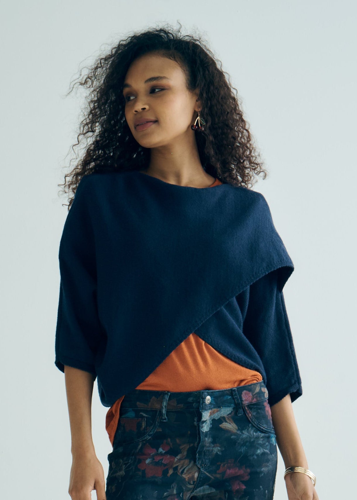 Hygge Italian Viscose Criss Cross Batwing Sleeve Knit In Navy