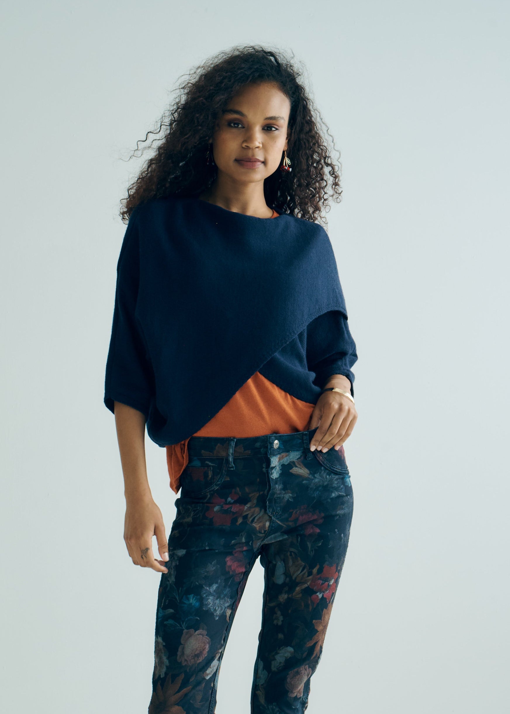 Hygge Italian Viscose Criss Cross Batwing Sleeve Knit In Navy