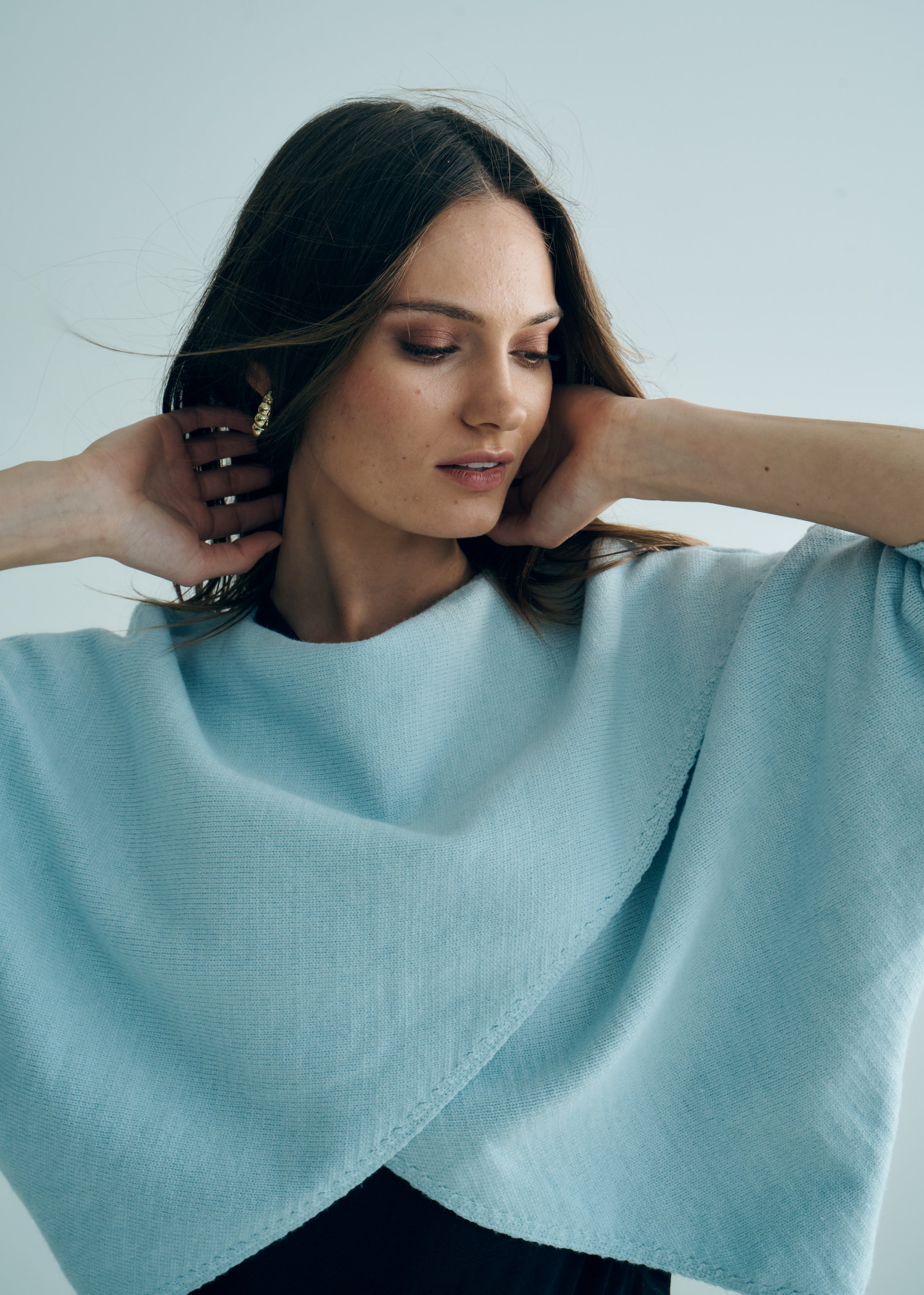 Hygge Italian Viscose Criss Cross Batwing Sleeve Knit In Light Blue