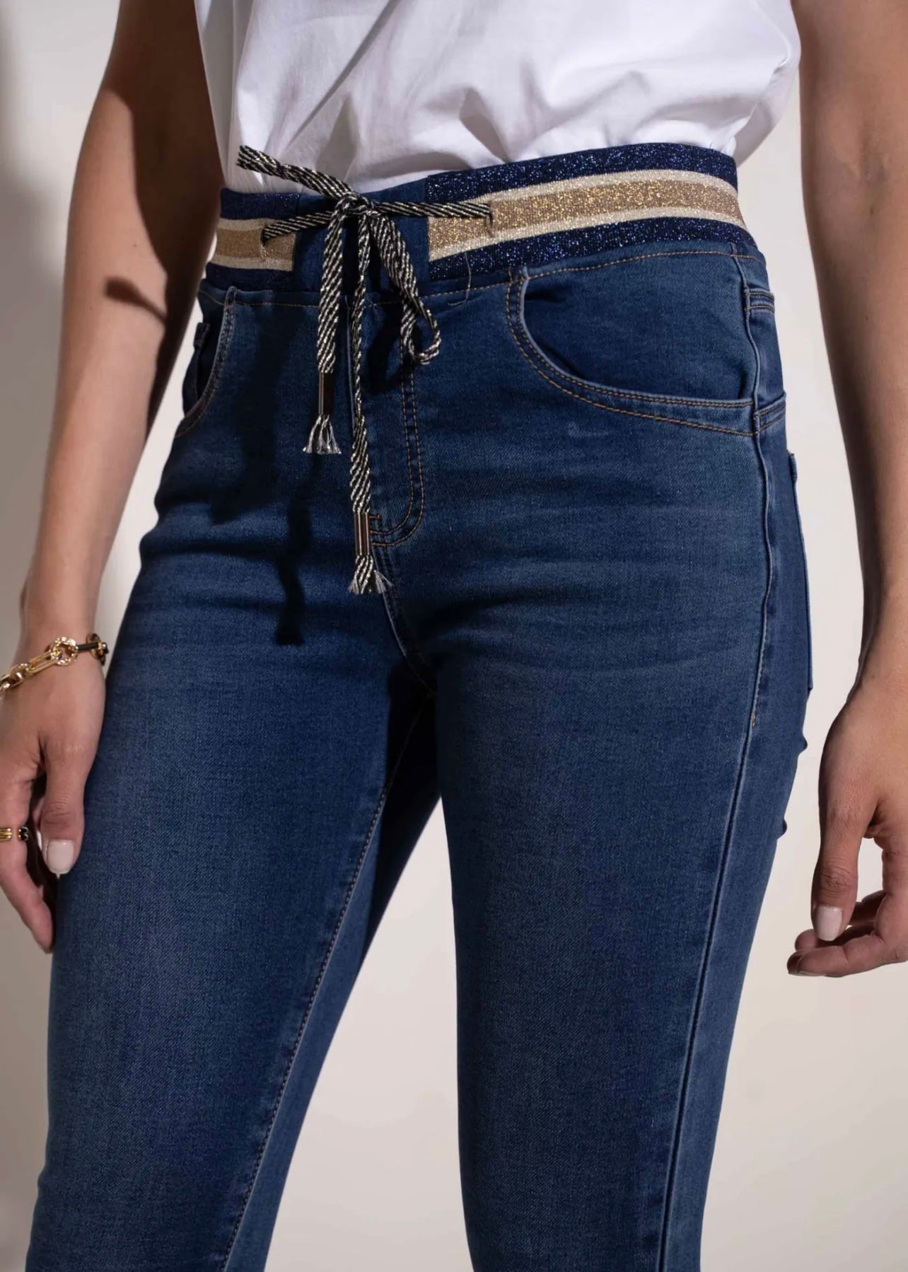 Mid-Rise Cotton Jogger Jeans in Blue with Gold Waist Band