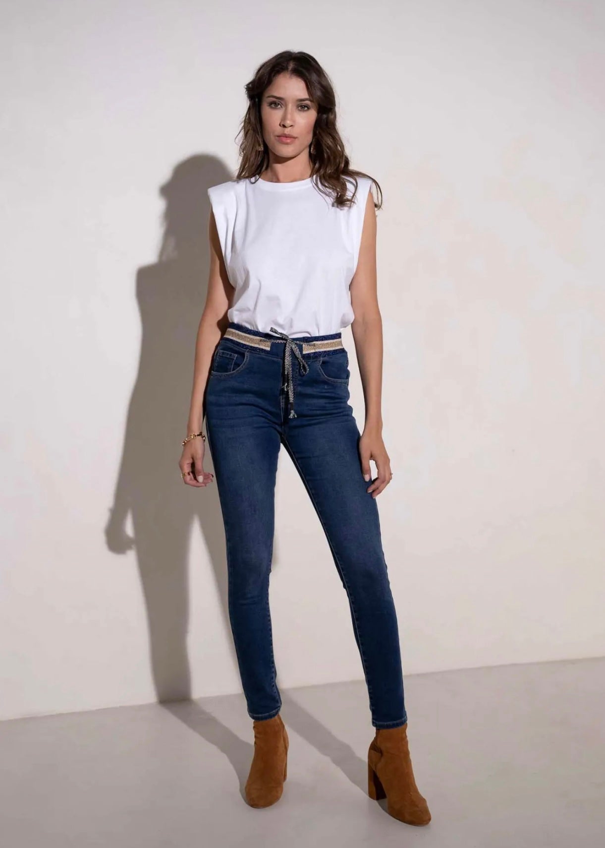Mid-Rise Cotton Jogger Jeans in Blue with Gold Waist Band