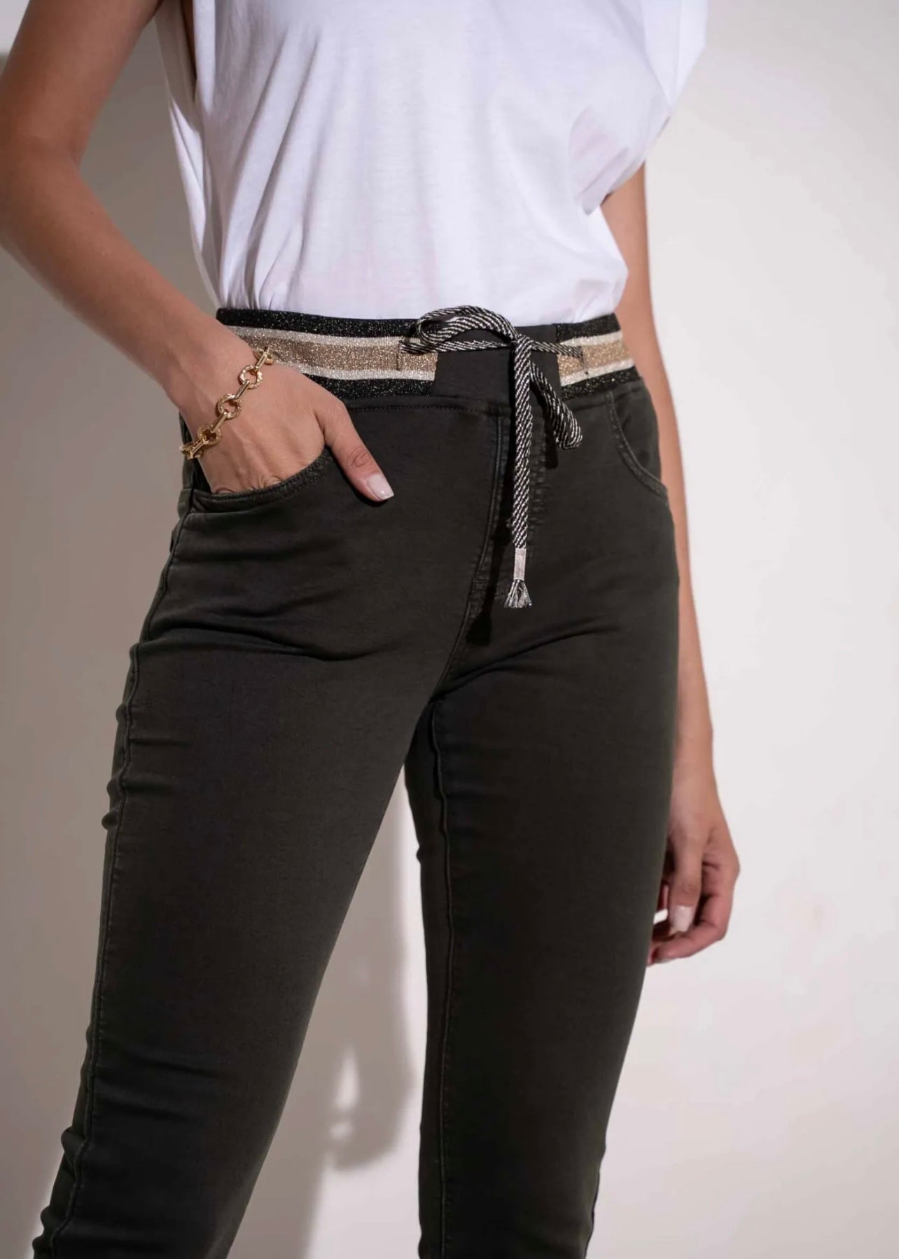 Mid-Rise Cotton Jogger Jeans in Khaki with Gold Waist Band