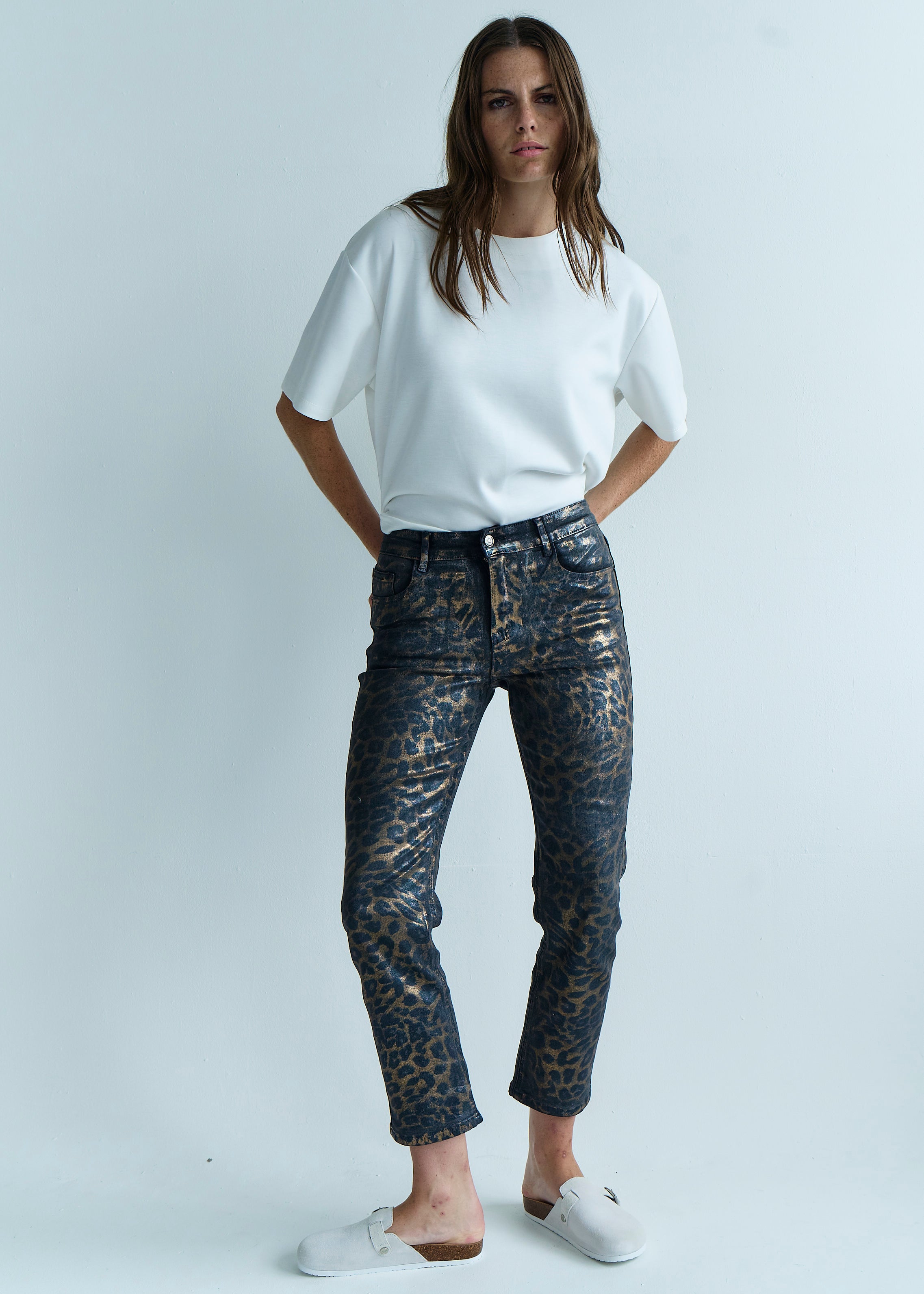 Coated Leopard Print Jeans In Black And Gold