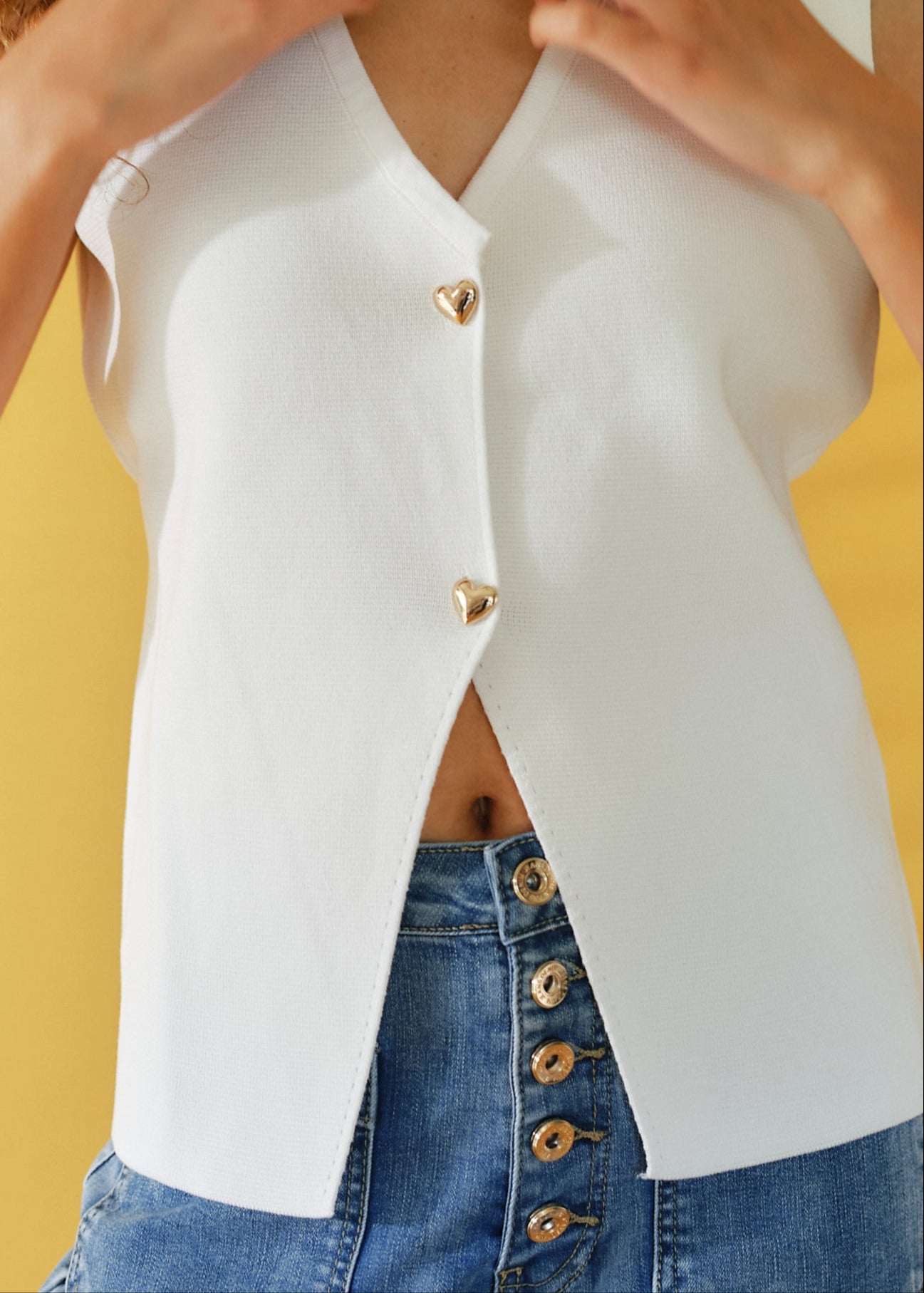 Sleeveless Knitted Cardi with Gold Heart Buttons in White