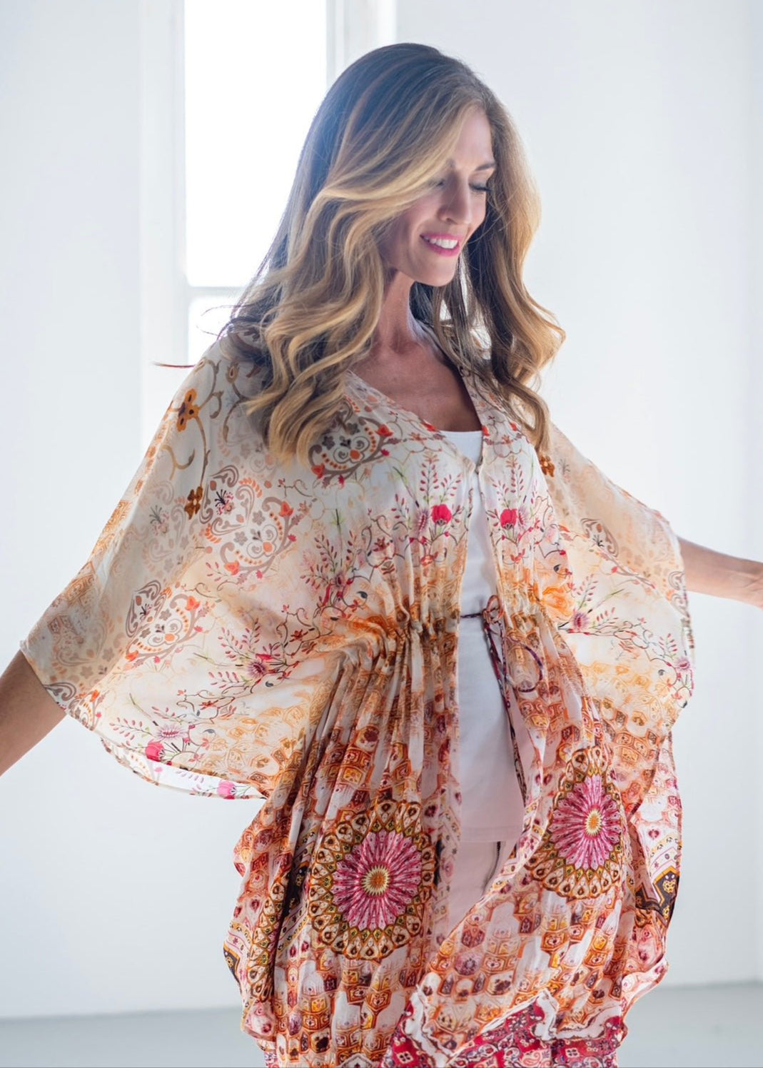 View our Lara Kaftan With Flower Print In Soft Peach - The ultimate DRESSES created by ICONIC and sold here, at Tribute Store