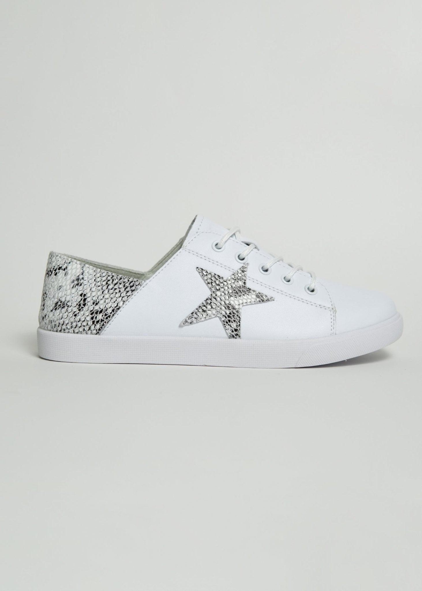 View our Nicki Snake Print Sneaker In White - The ultimate SHOES created by Julz and sold here, at Tribute Store