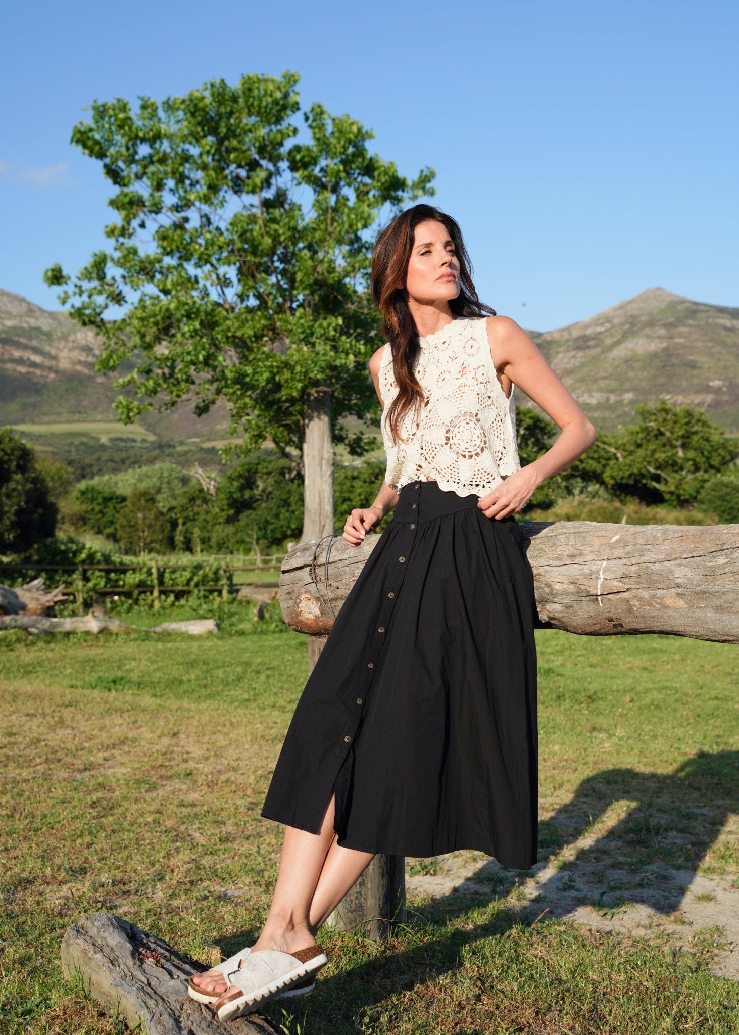 View our 3/4 Skirt with front Buttons in Black - by Tribute Store