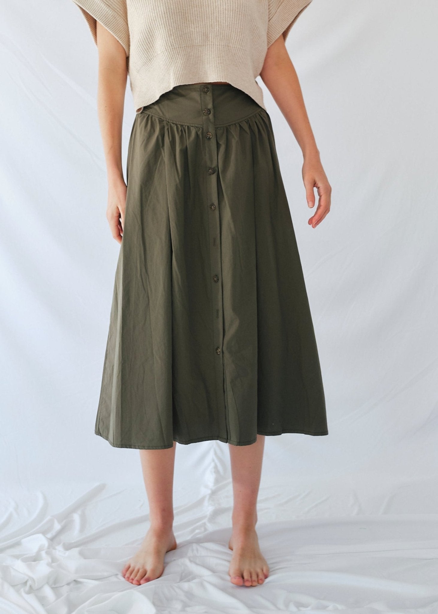 View our 3/4 Skirt with front Buttons in Khaki - by Tribute Store