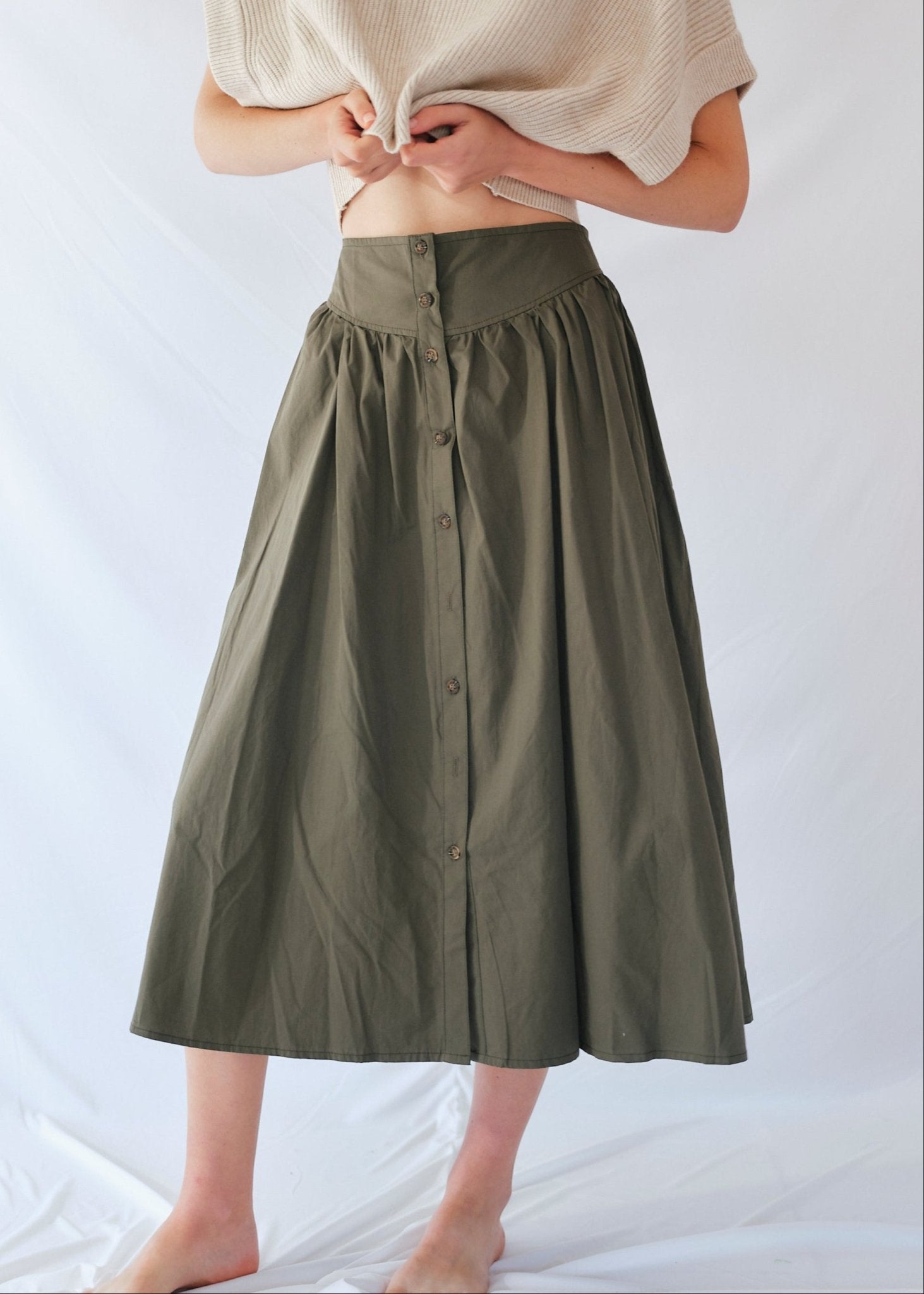 View our 3/4 Skirt with front Buttons in Khaki - by Tribute Store