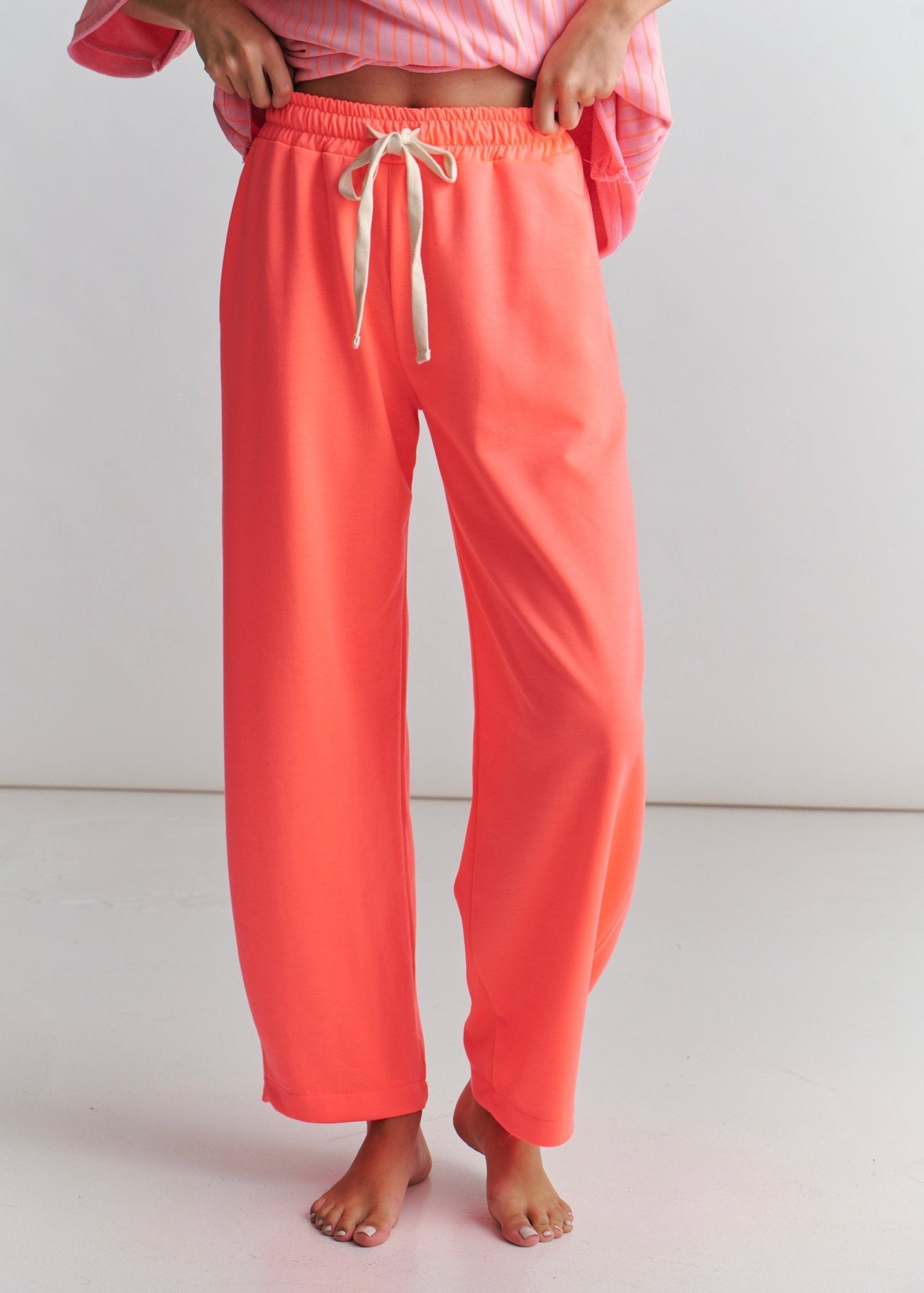 View our Barrel Track Pants In Neon Pink /Orange - by Tribute Store