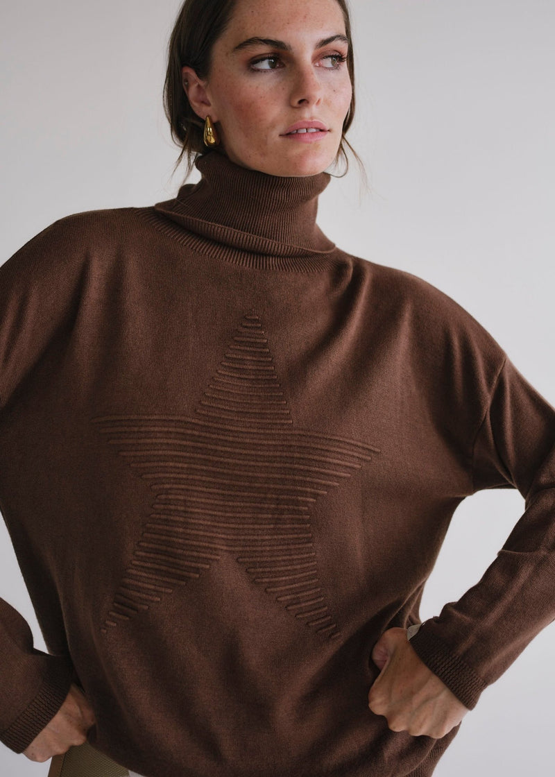 View our Bastille Chocolate Polo Neck Knit with Star front - by Tribute Store