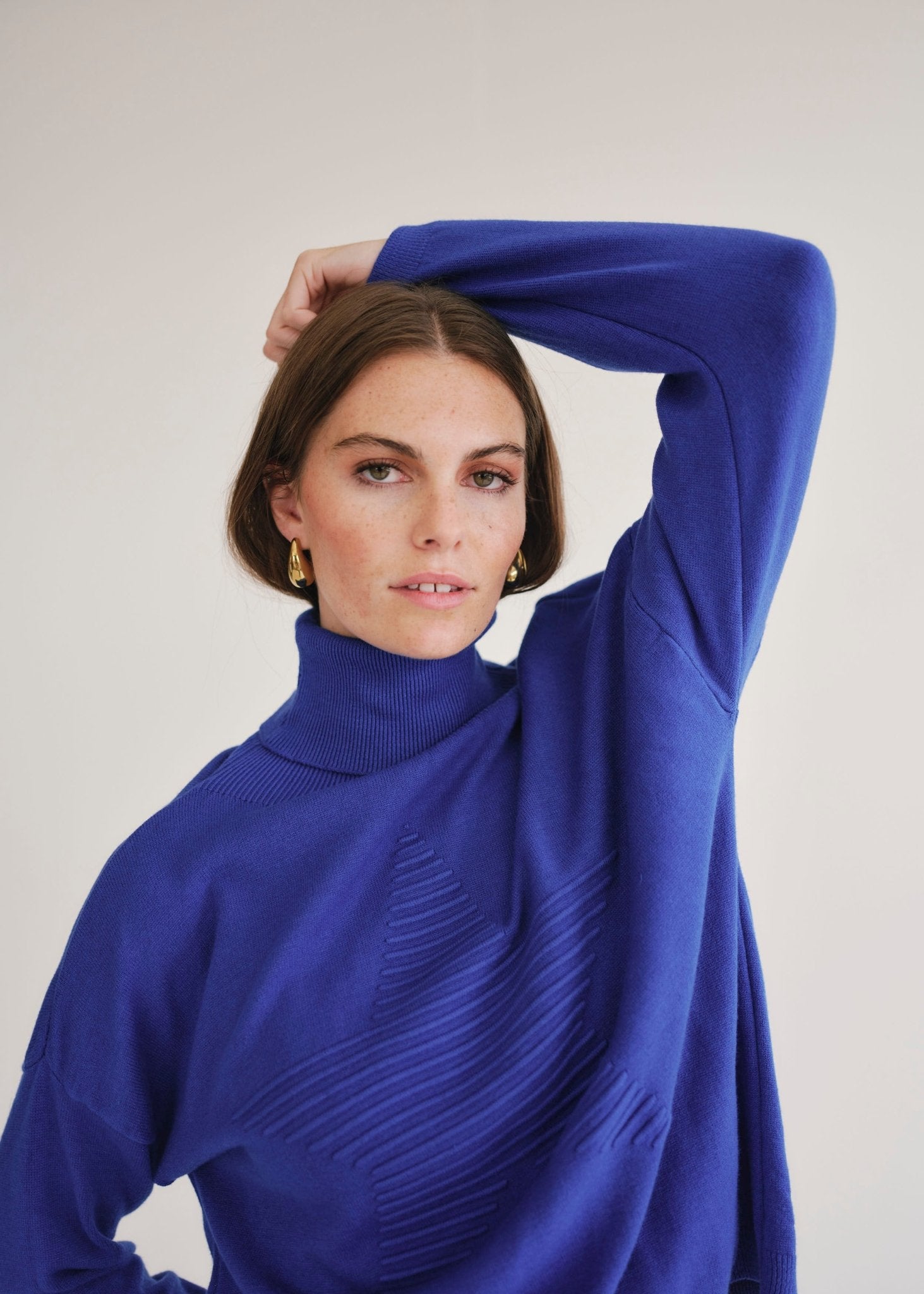 View our Bastille Royal Blue Polo Neck Knit with Star Front - by Tribute Store