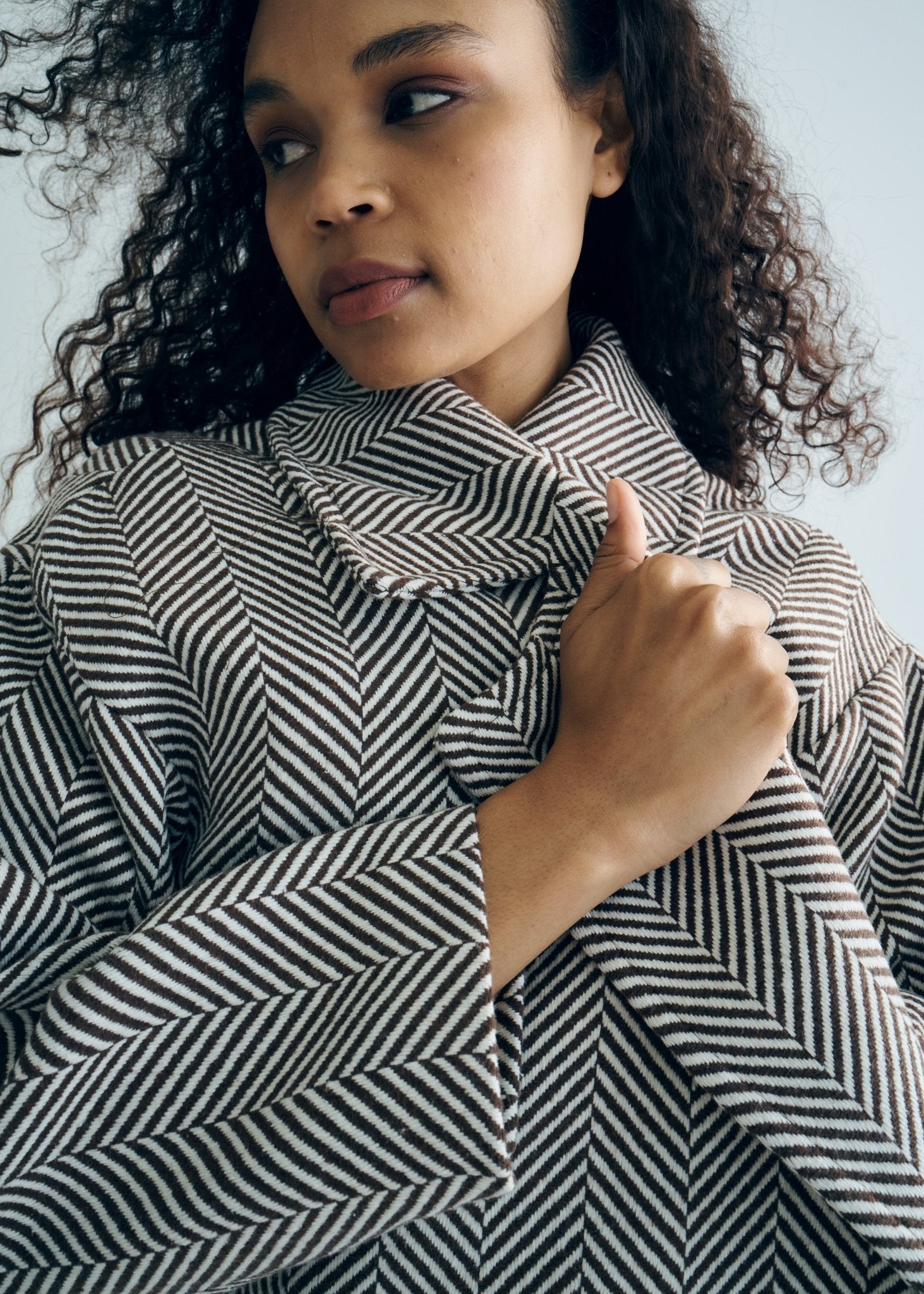 View our Bordeaux Wool Coat in Chocolate Brown and White - by Tribute Store