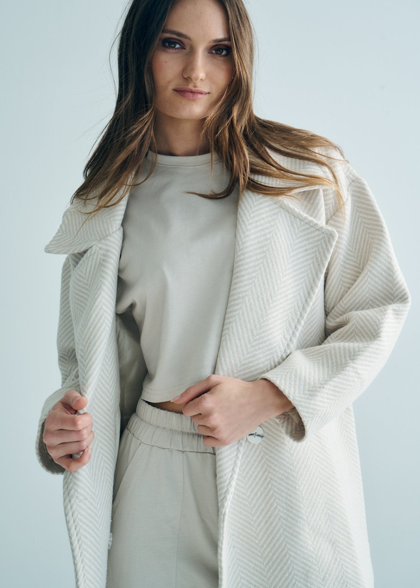 View our Bordeaux Wool Coat in Cream and White - by Tribute Store