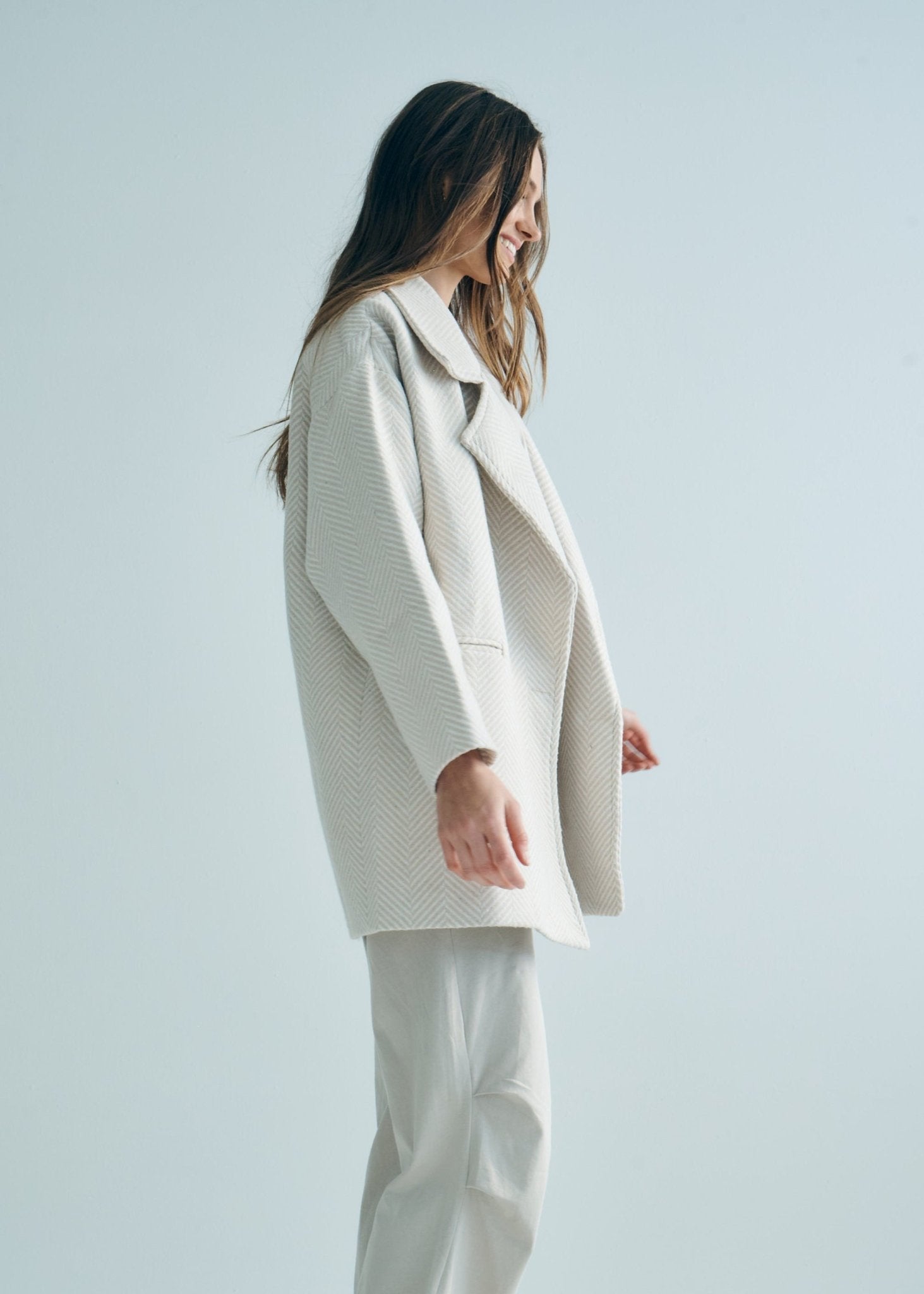 View our Bordeaux Wool Coat in Cream and White - by Tribute Store