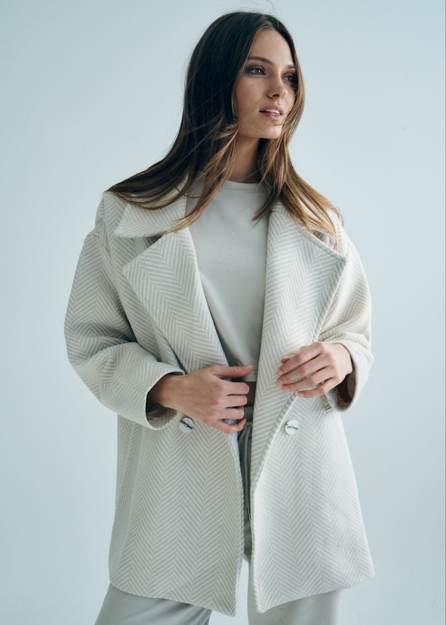 View our Bordeaux Wool Coat in Cream and White - by Tribute Store