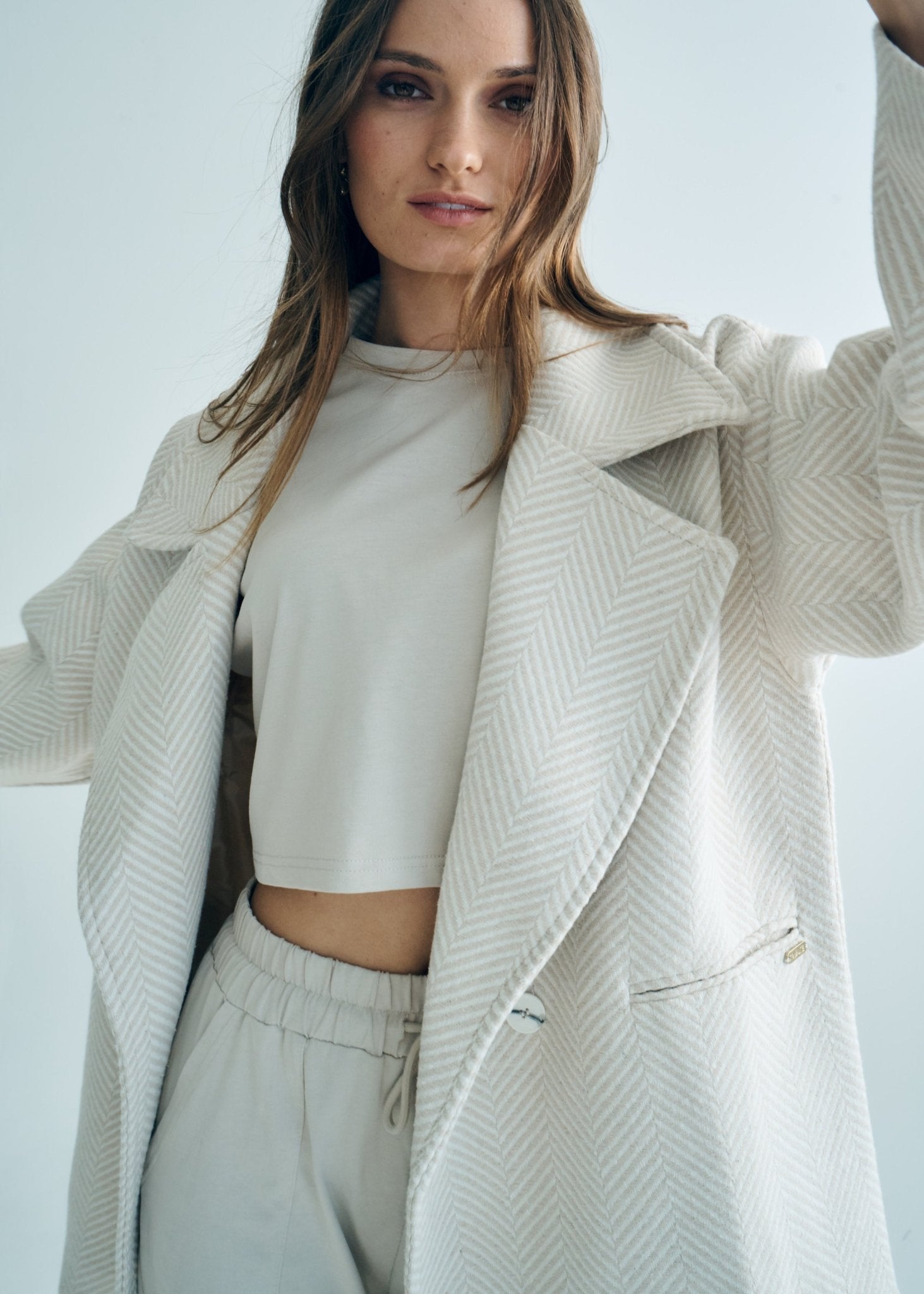 View our Bordeaux Wool Coat in Cream and White - by Tribute Store