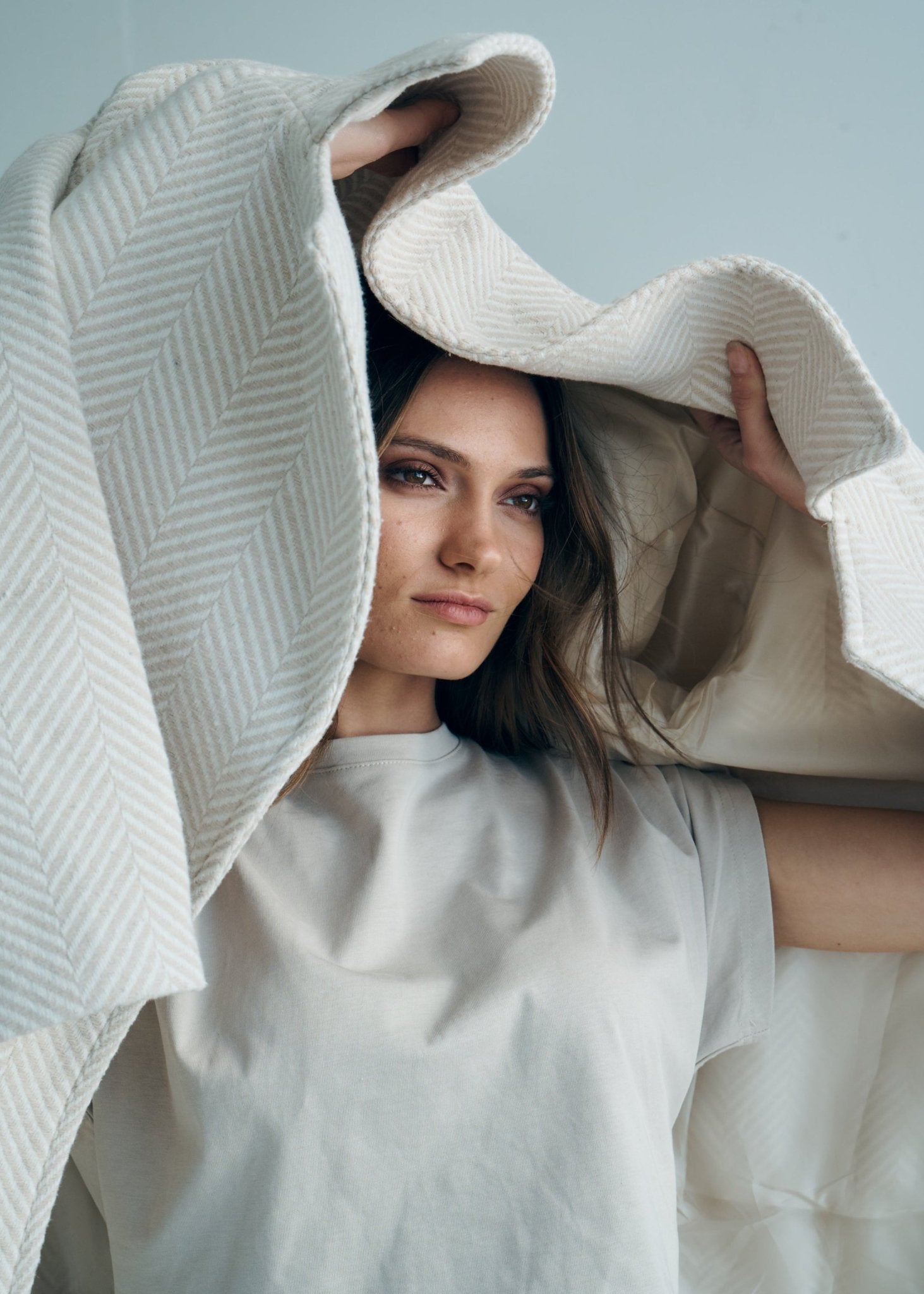 View our Bordeaux Wool Coat in Cream and White - by Tribute Store